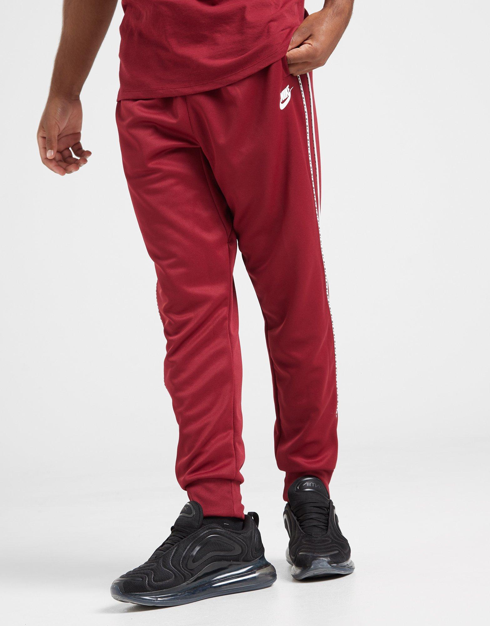 nike tape track pants red