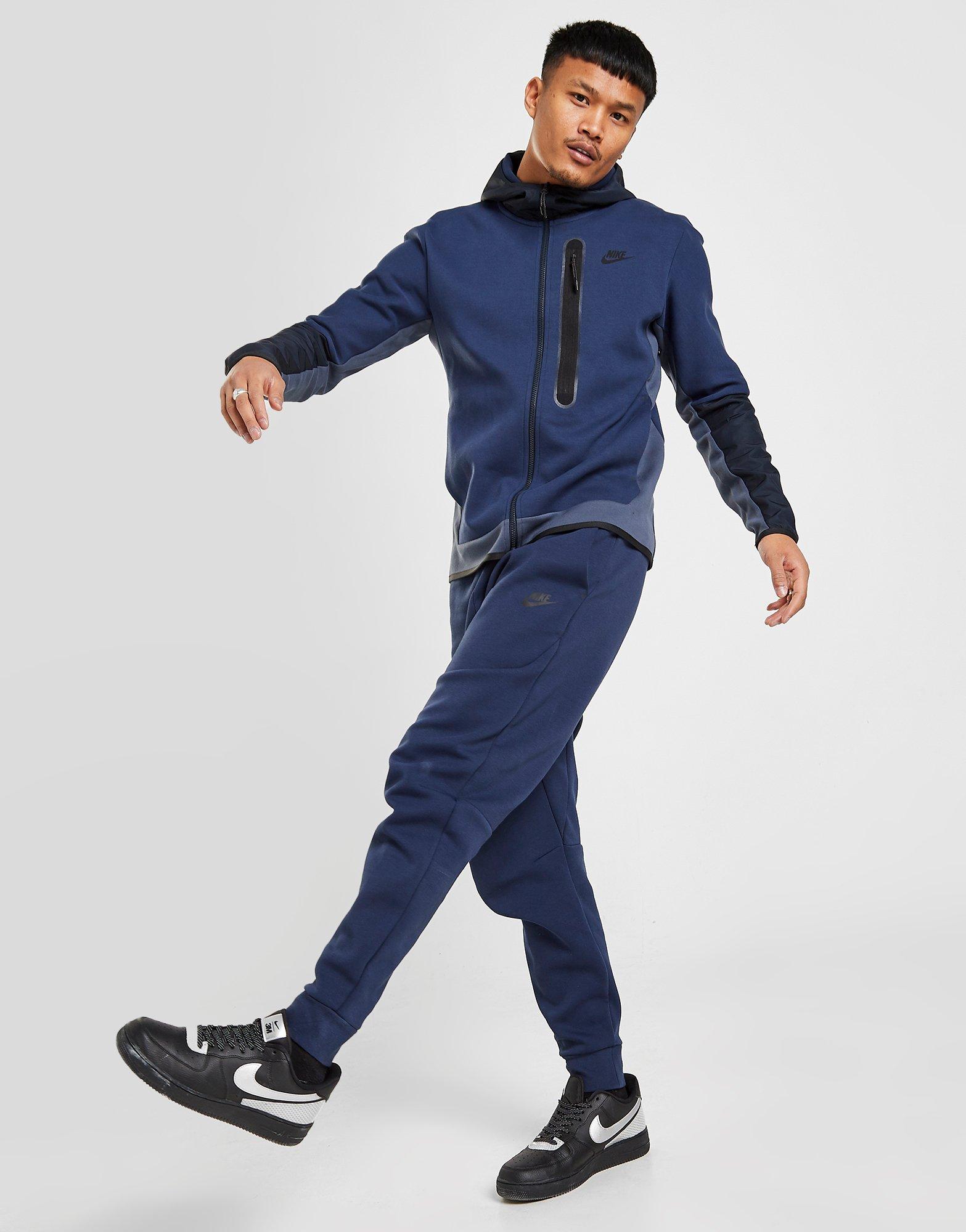 nike tech tracksuit navy blue