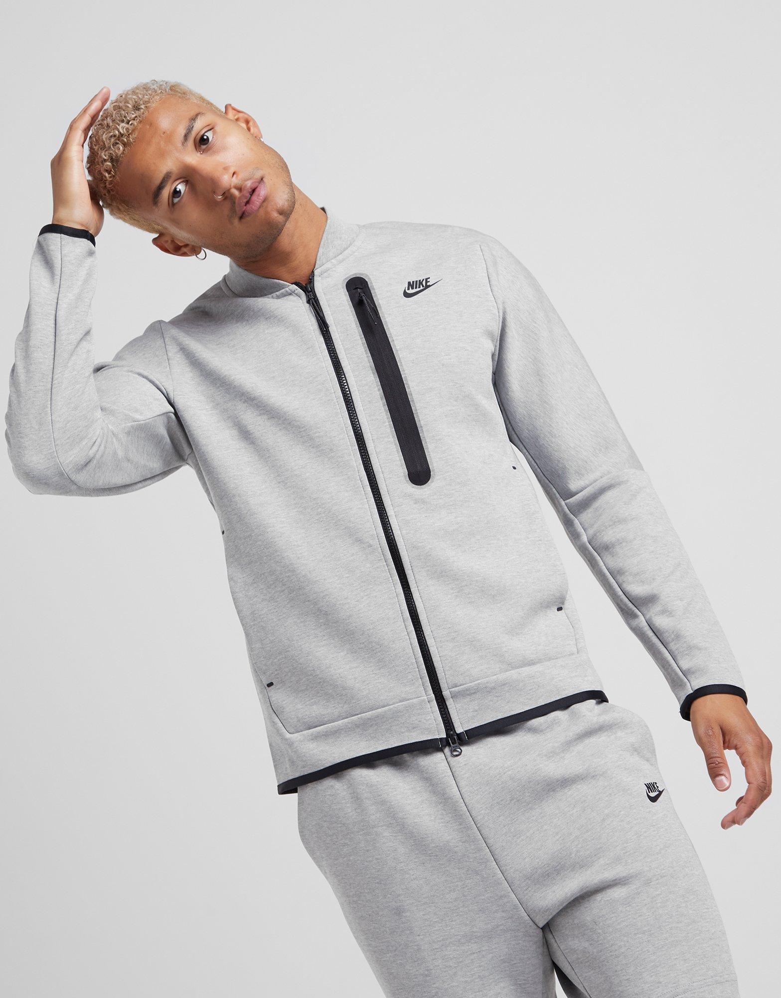 grey nike tracksuit top