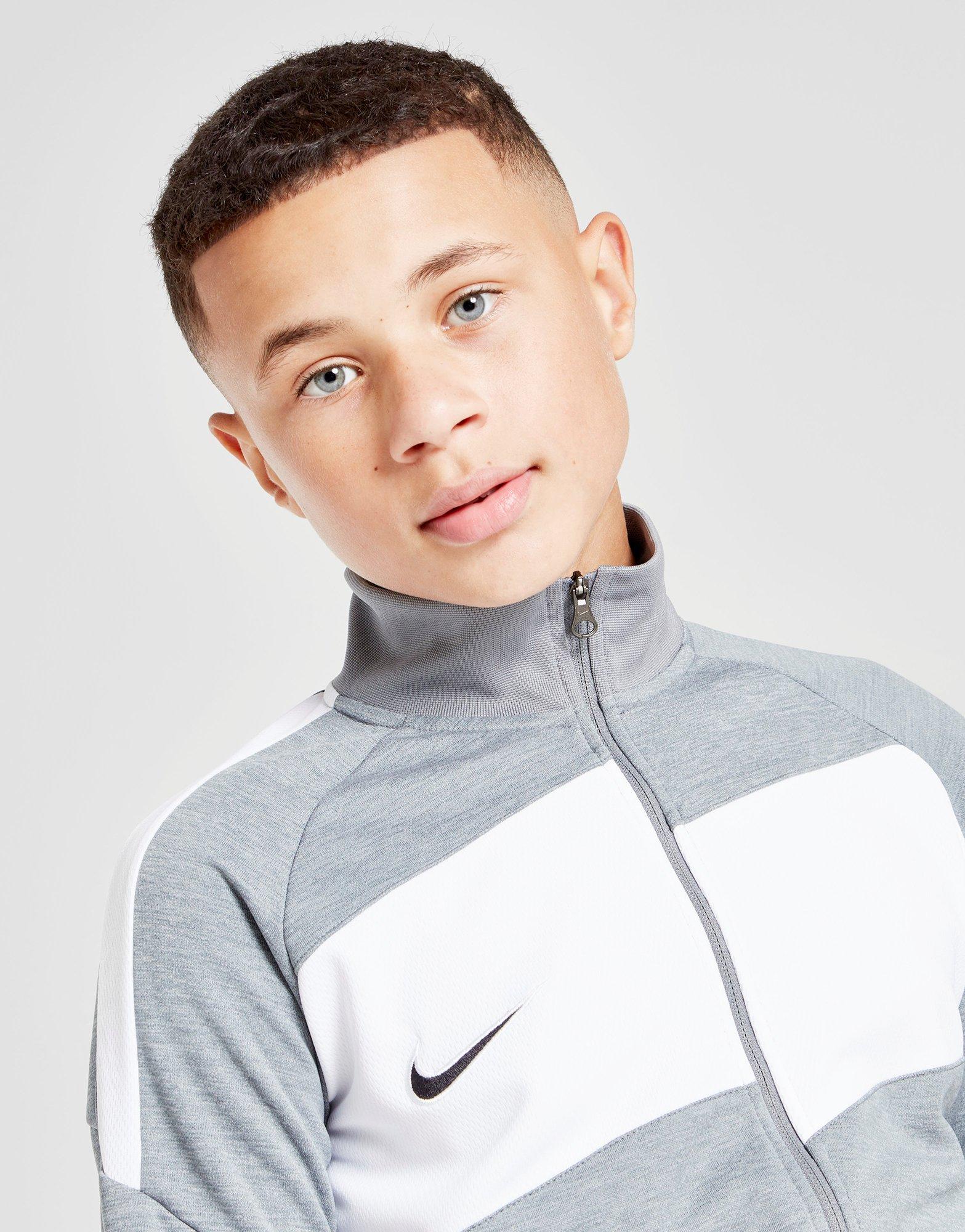 grey nike track top