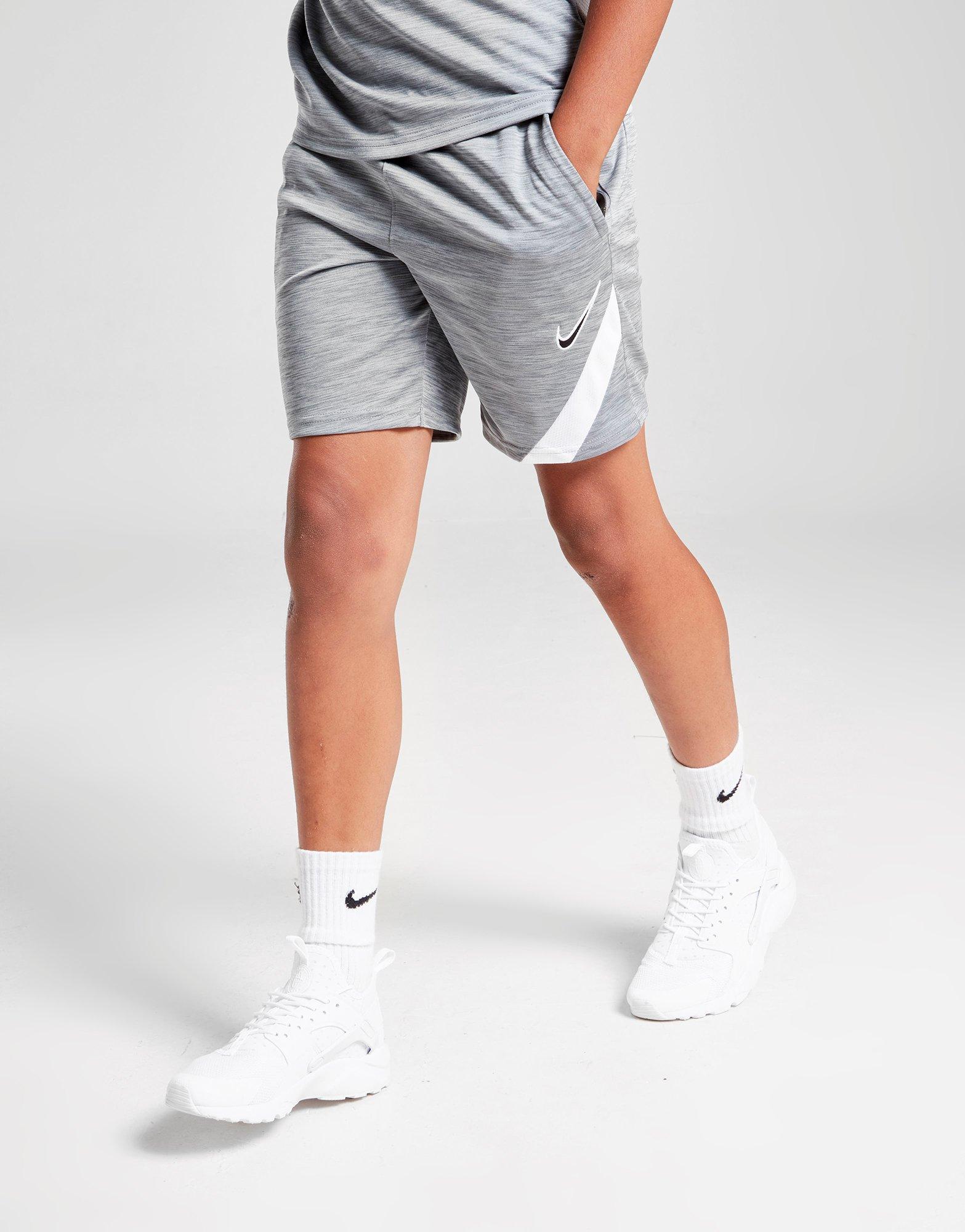 grey nike shorts junior