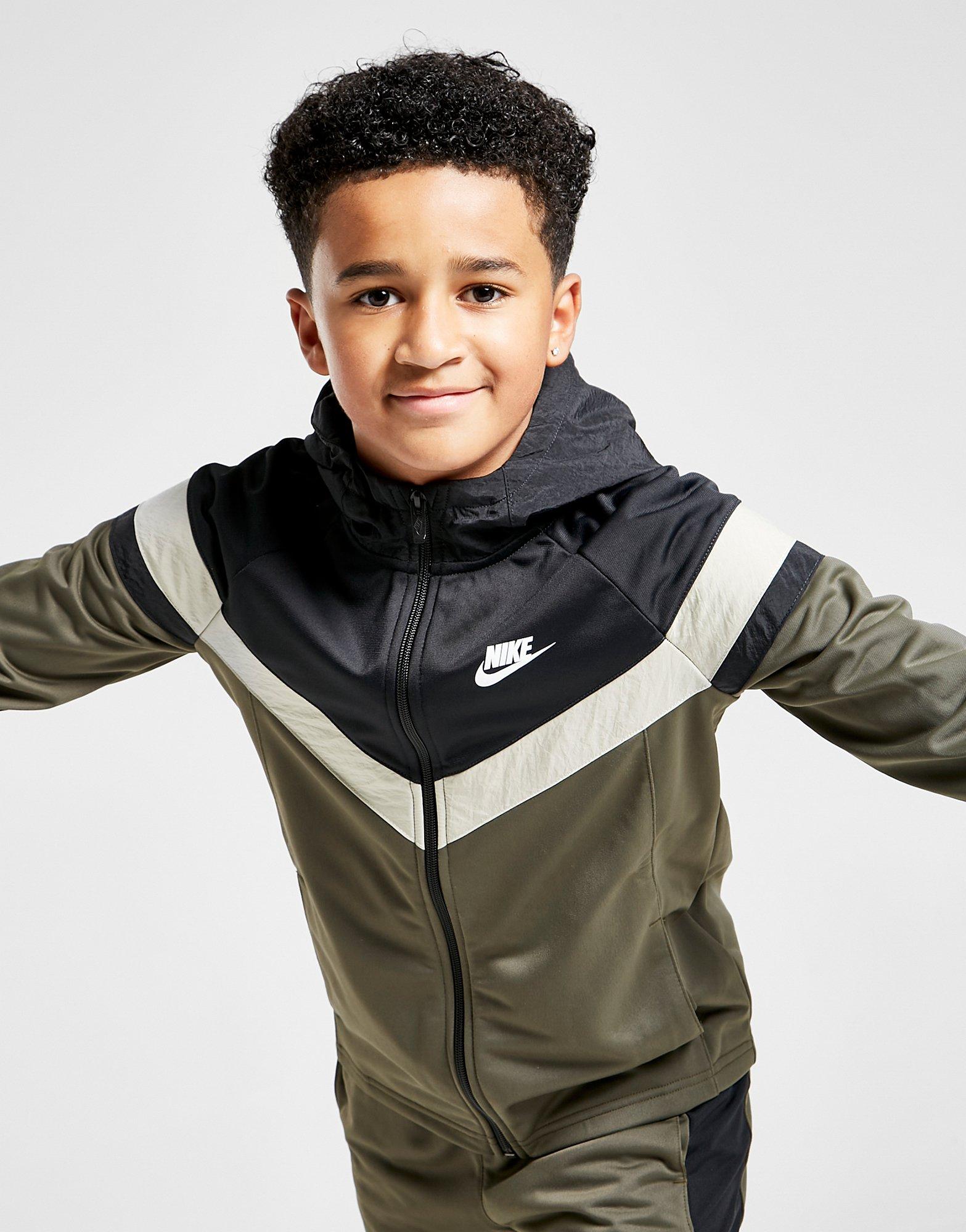 nike woven tracksuit junior