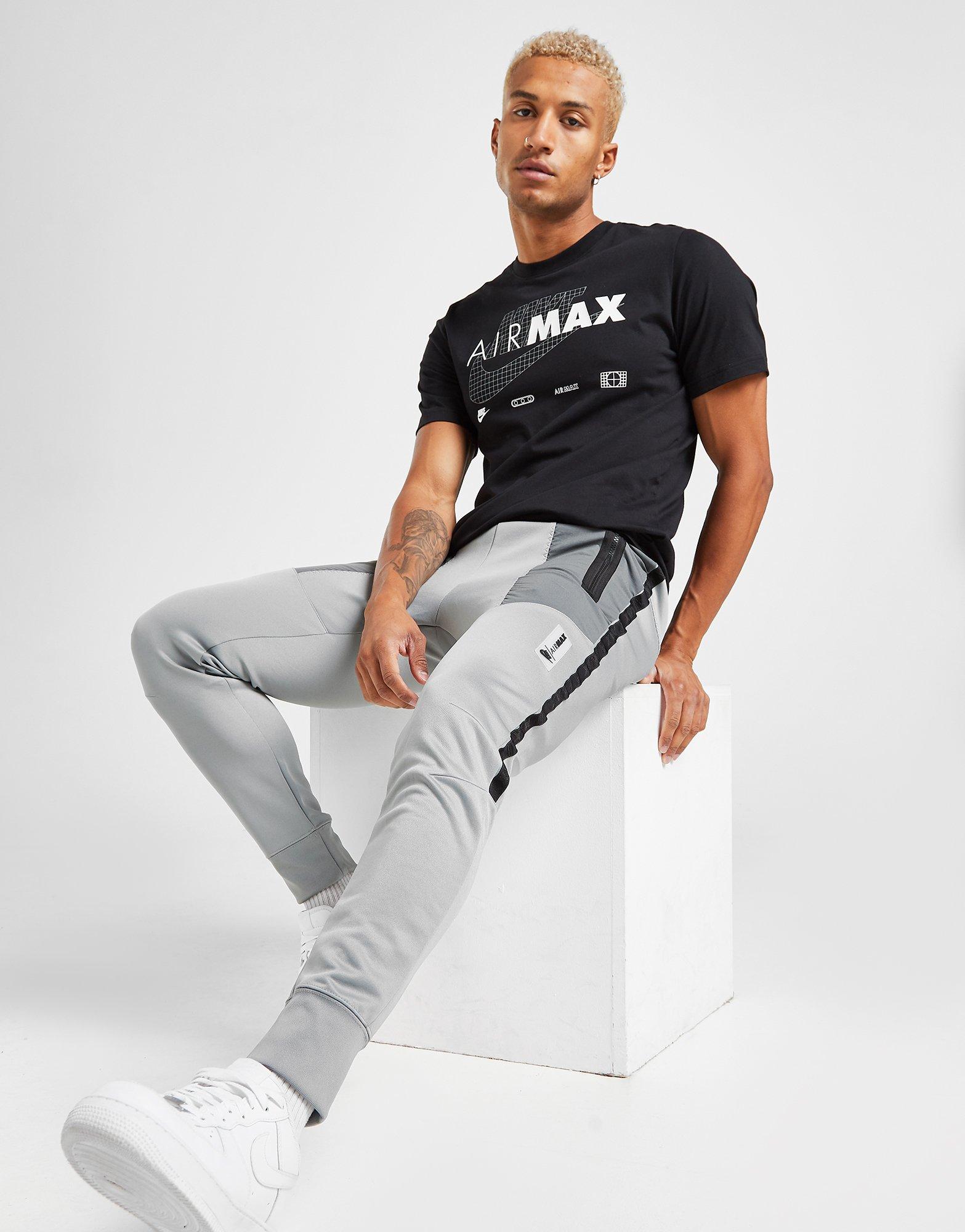 Acquista Nike Air Max Pantaloni della tuta in Grigio