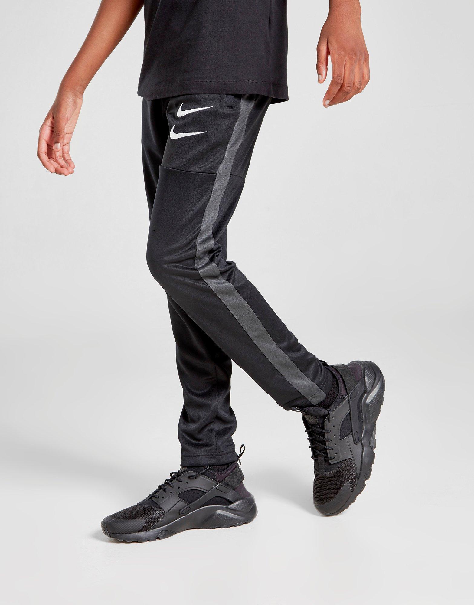 nike pants swoosh