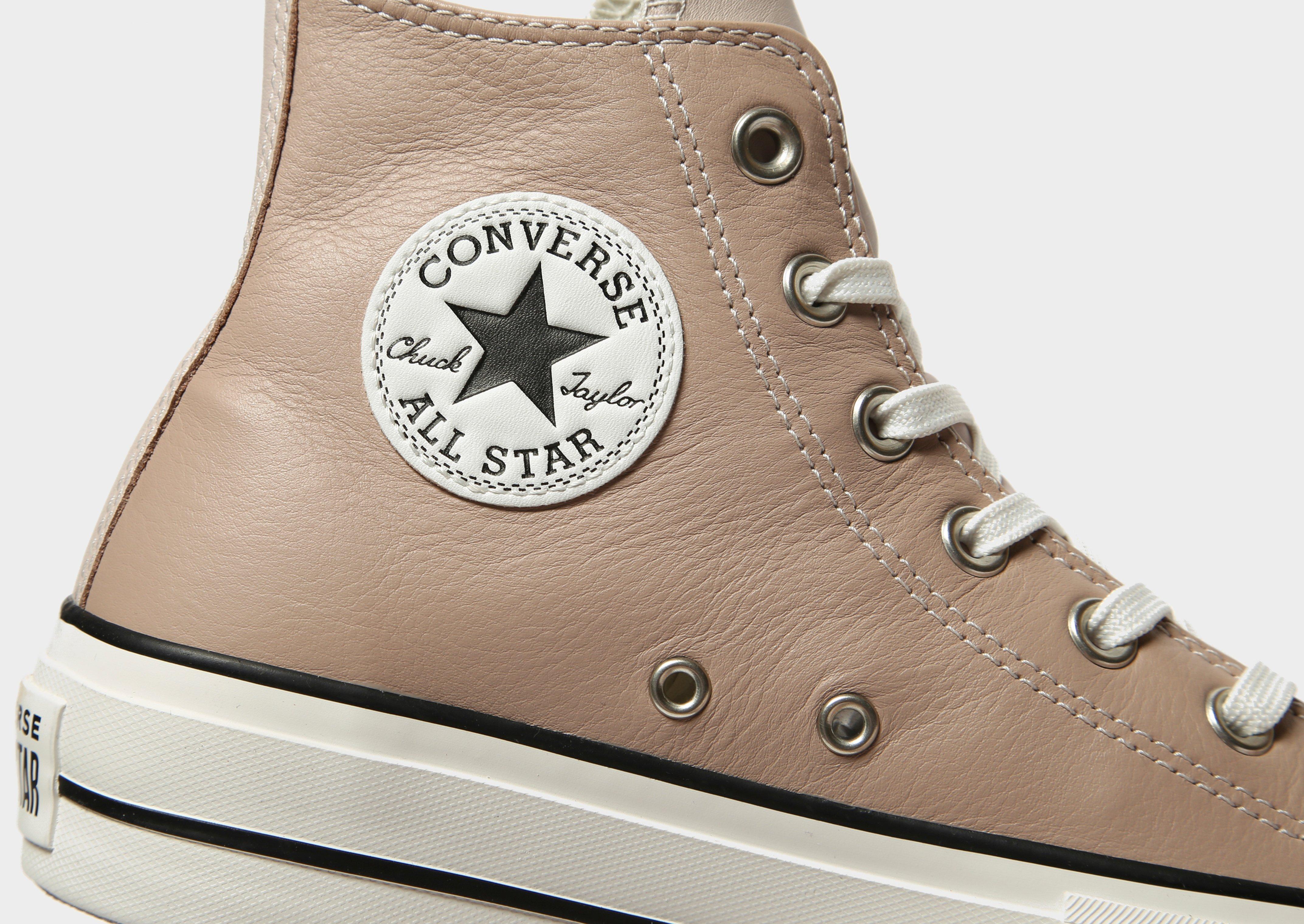 beige leather converse
