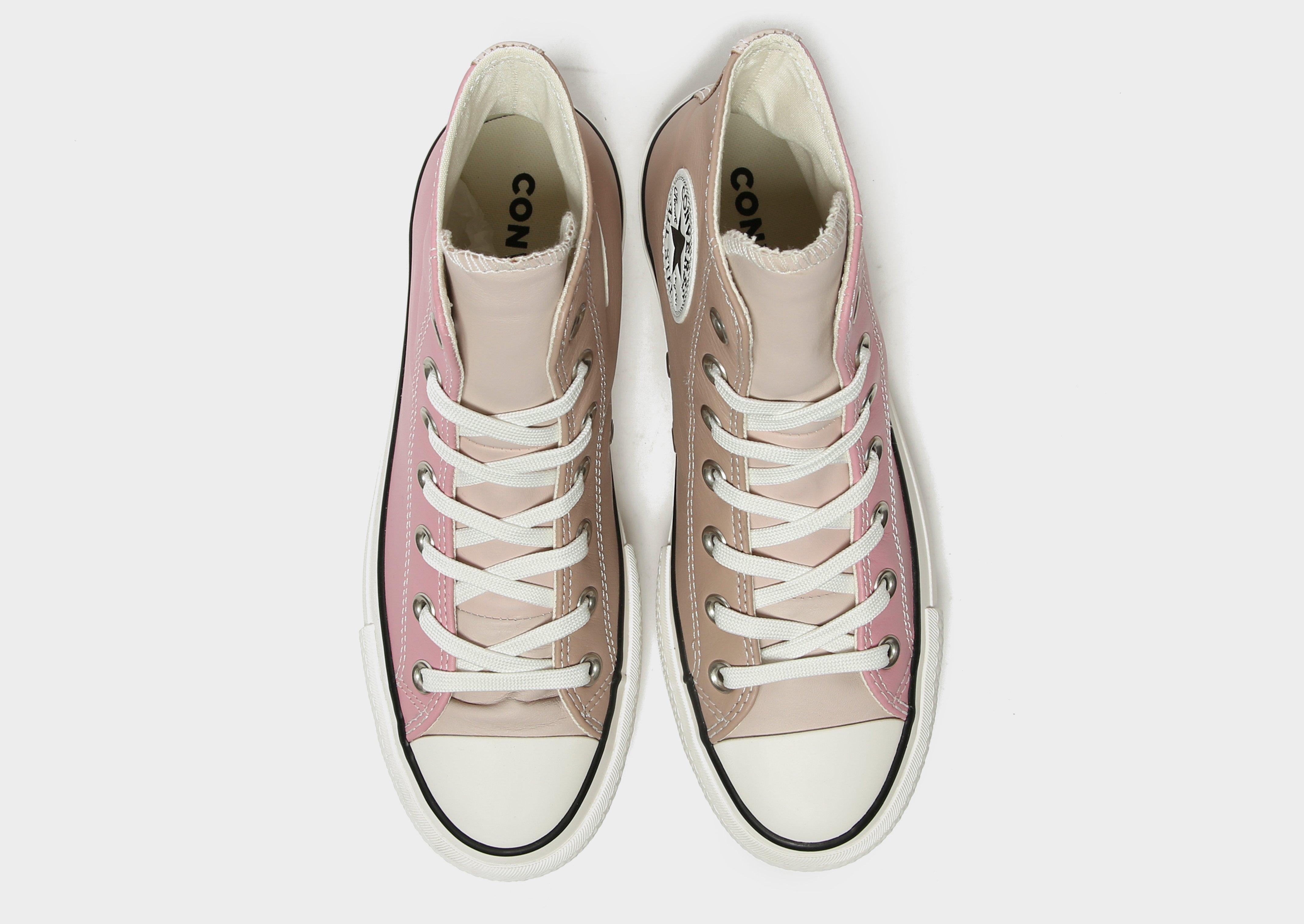 beige leather converse