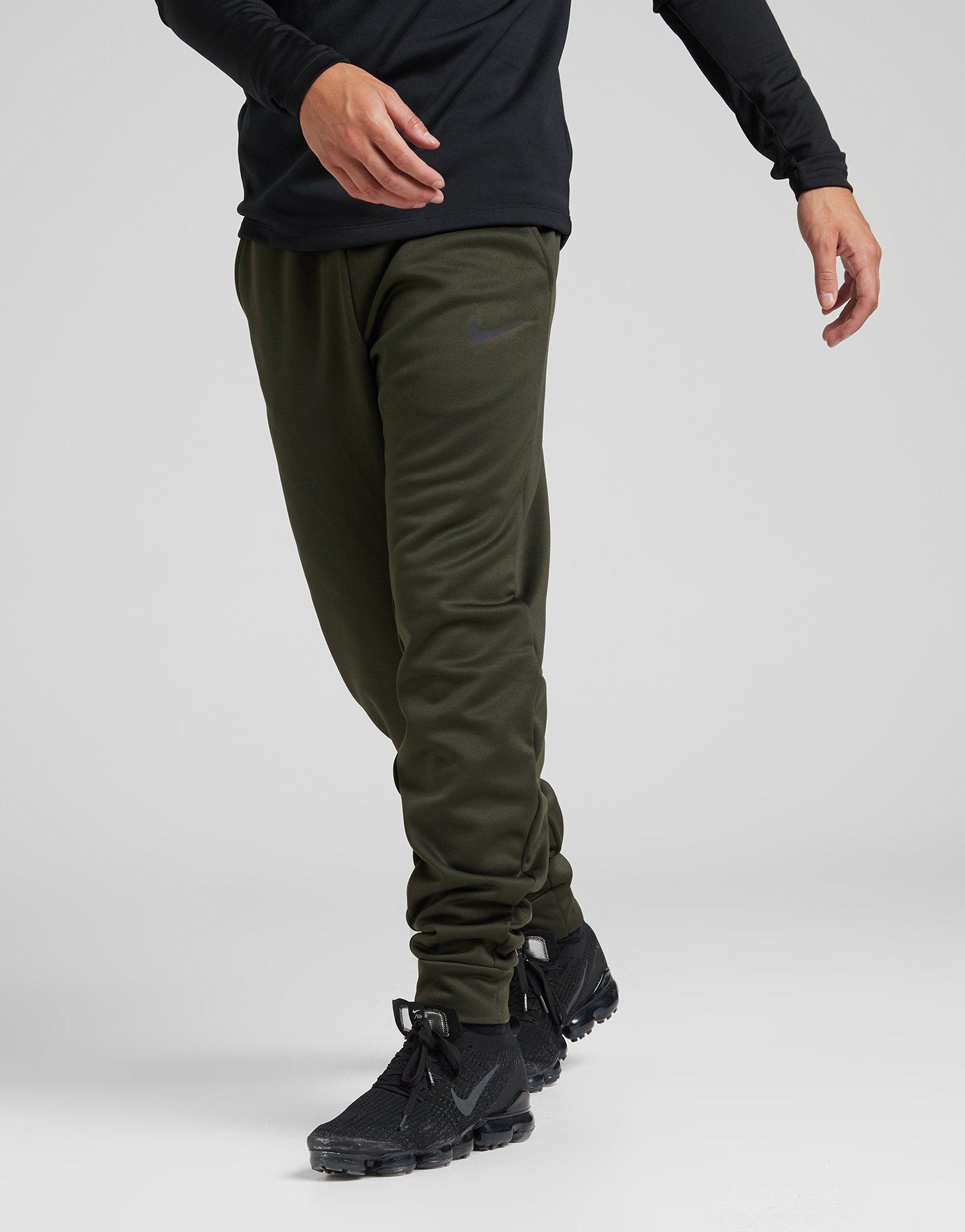 nike training therma track pants