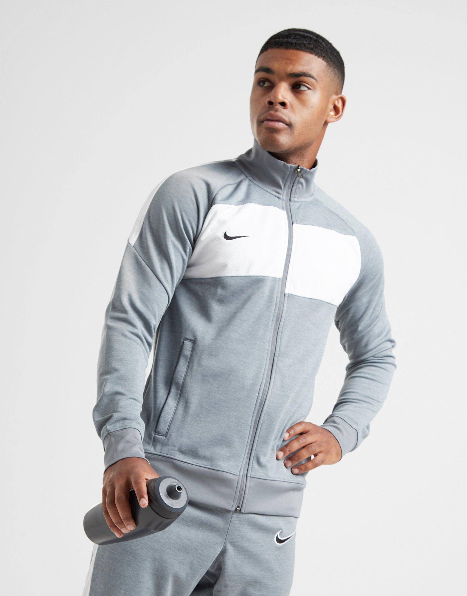 grey nike tracksuit top