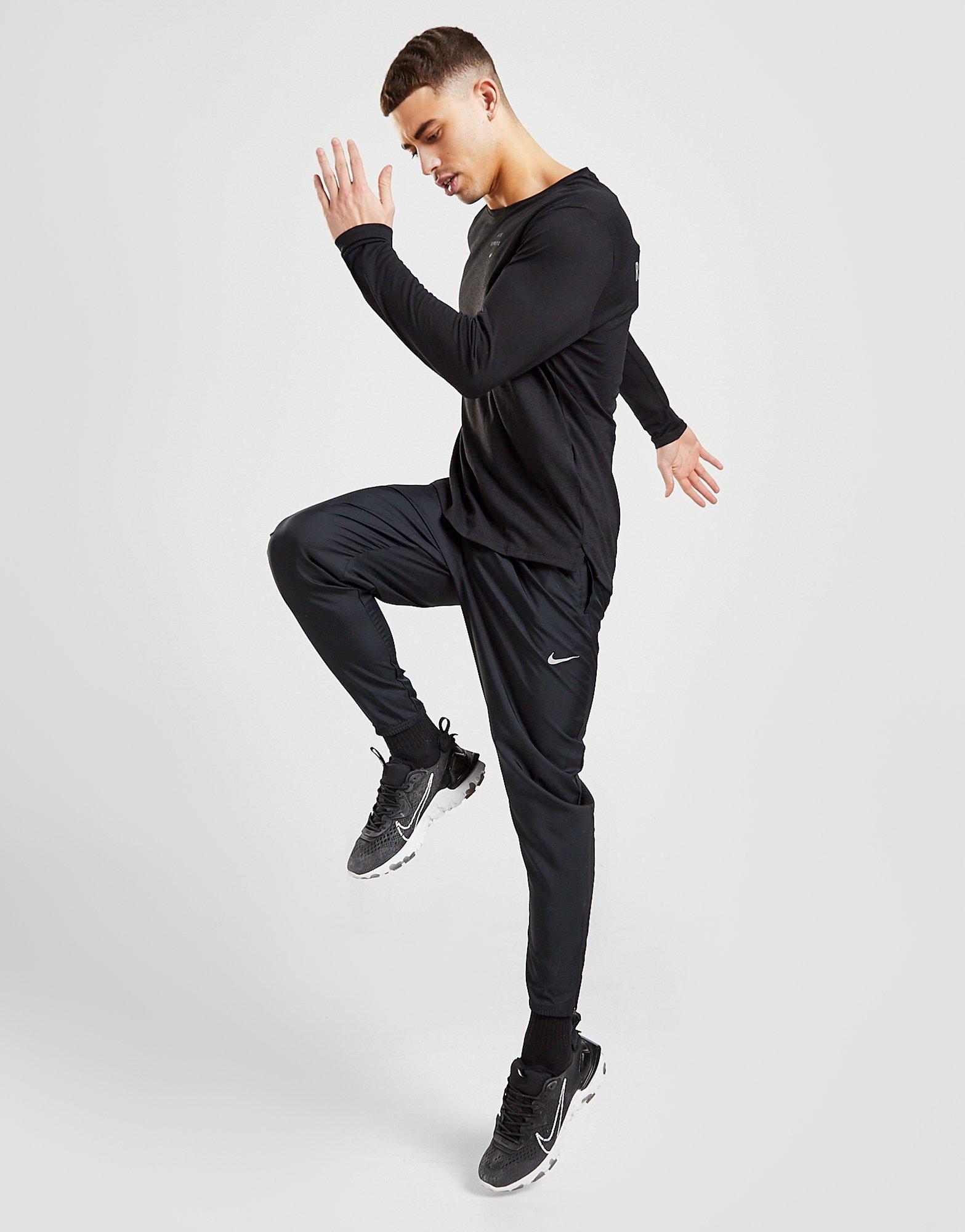 nike running essential woven sweatpants in black