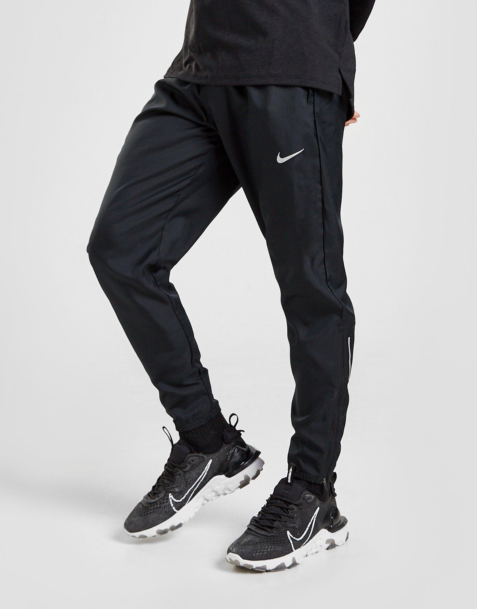 nike woven tracksuit bottoms