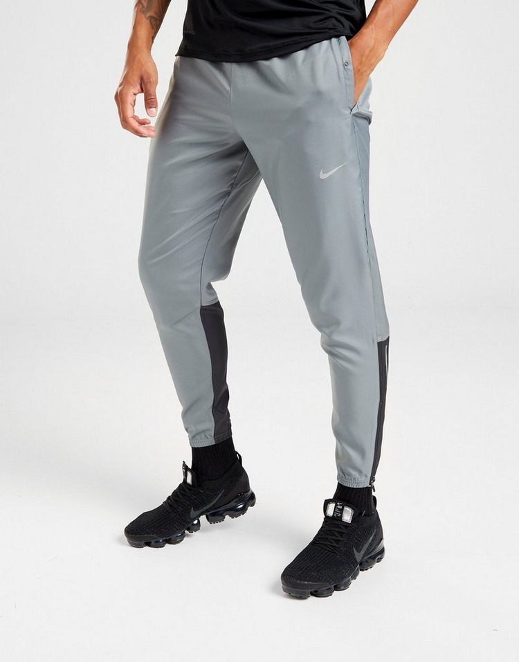 Grey Nike Essential Woven Running Track Pants | JD Sports