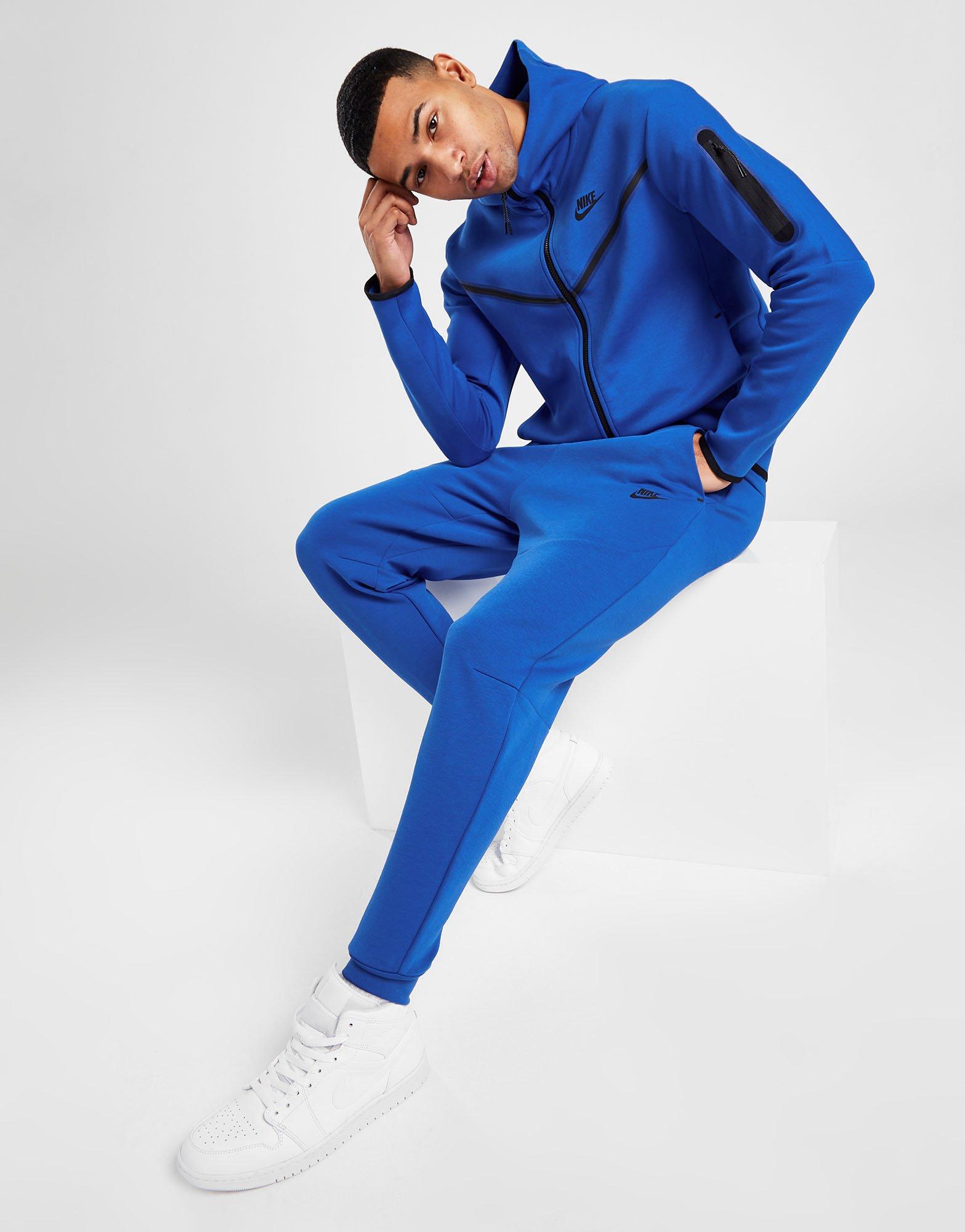 nike tech tracksuit blue