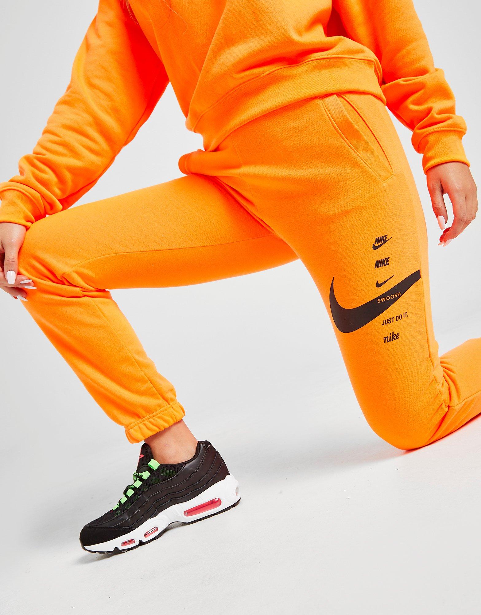 nike double swoosh joggers orange