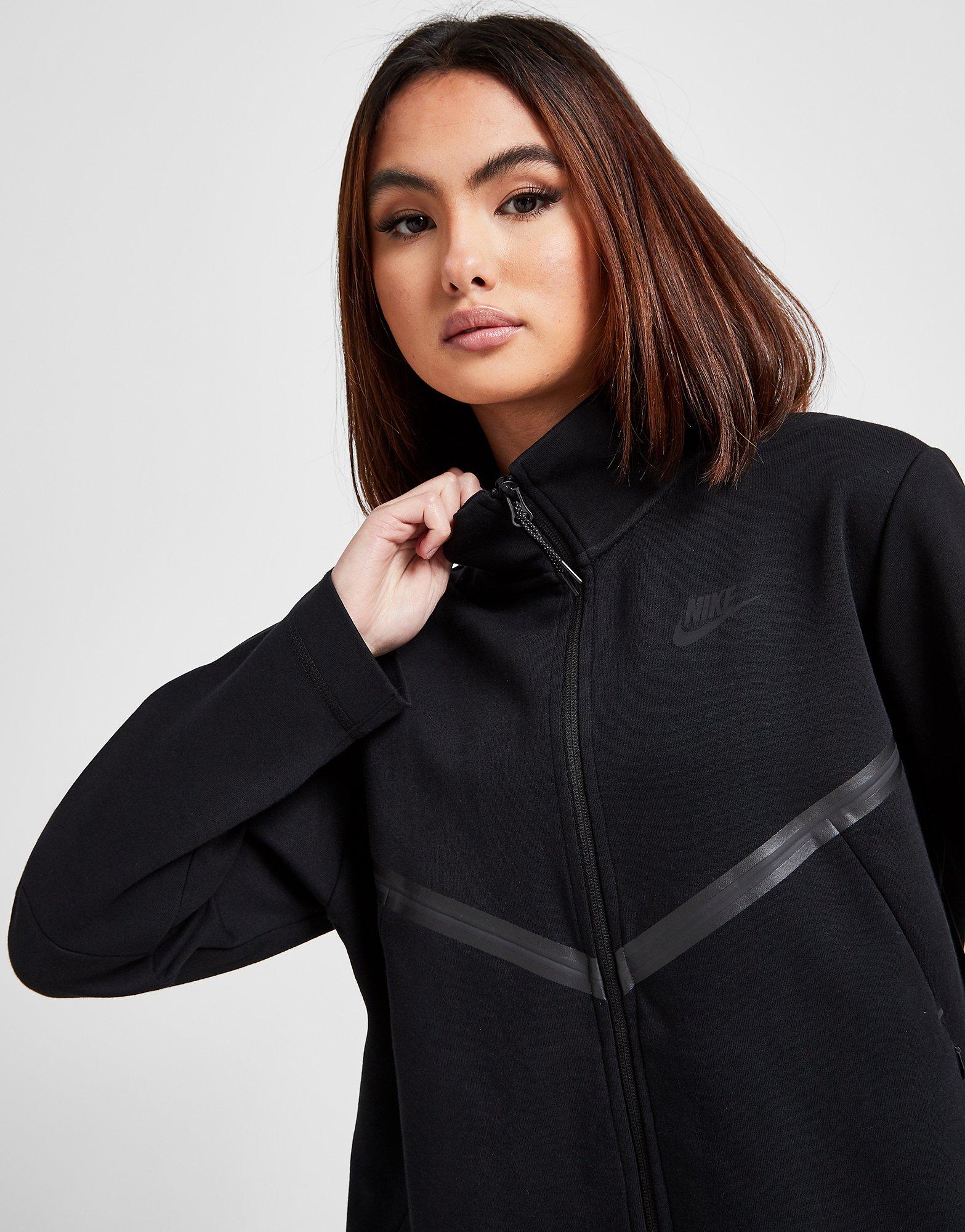 nike tech track top