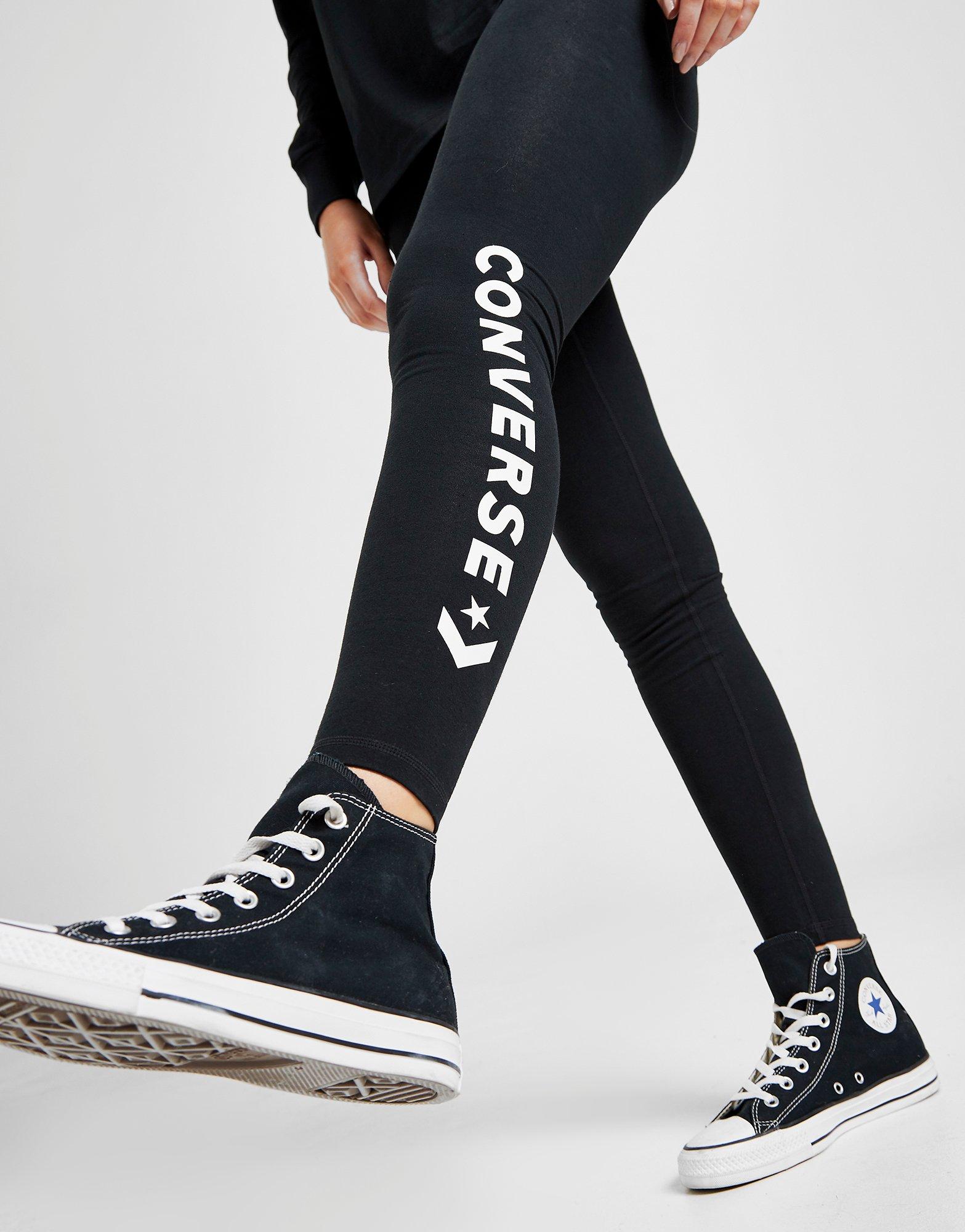 leggings and high top converse
