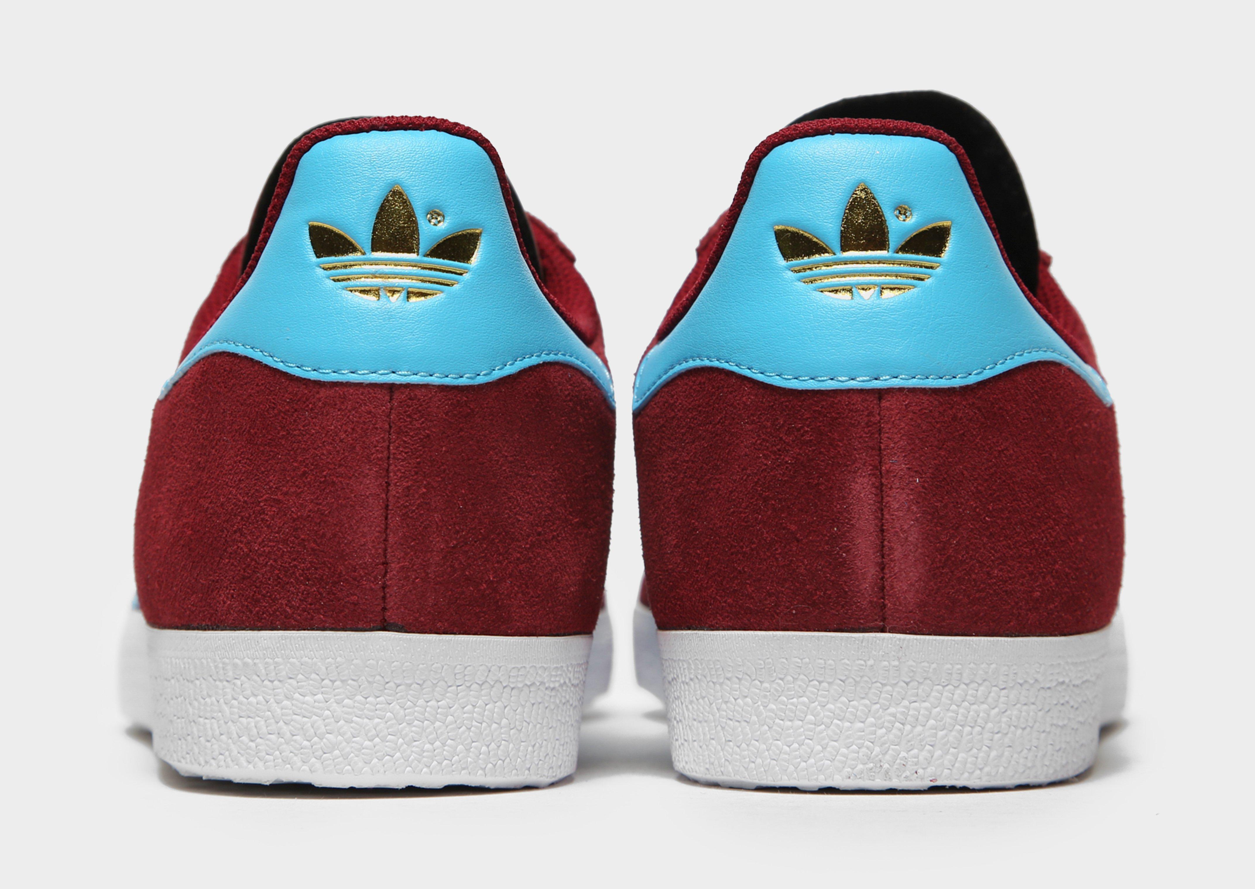 jd sports claret and blue trainers
