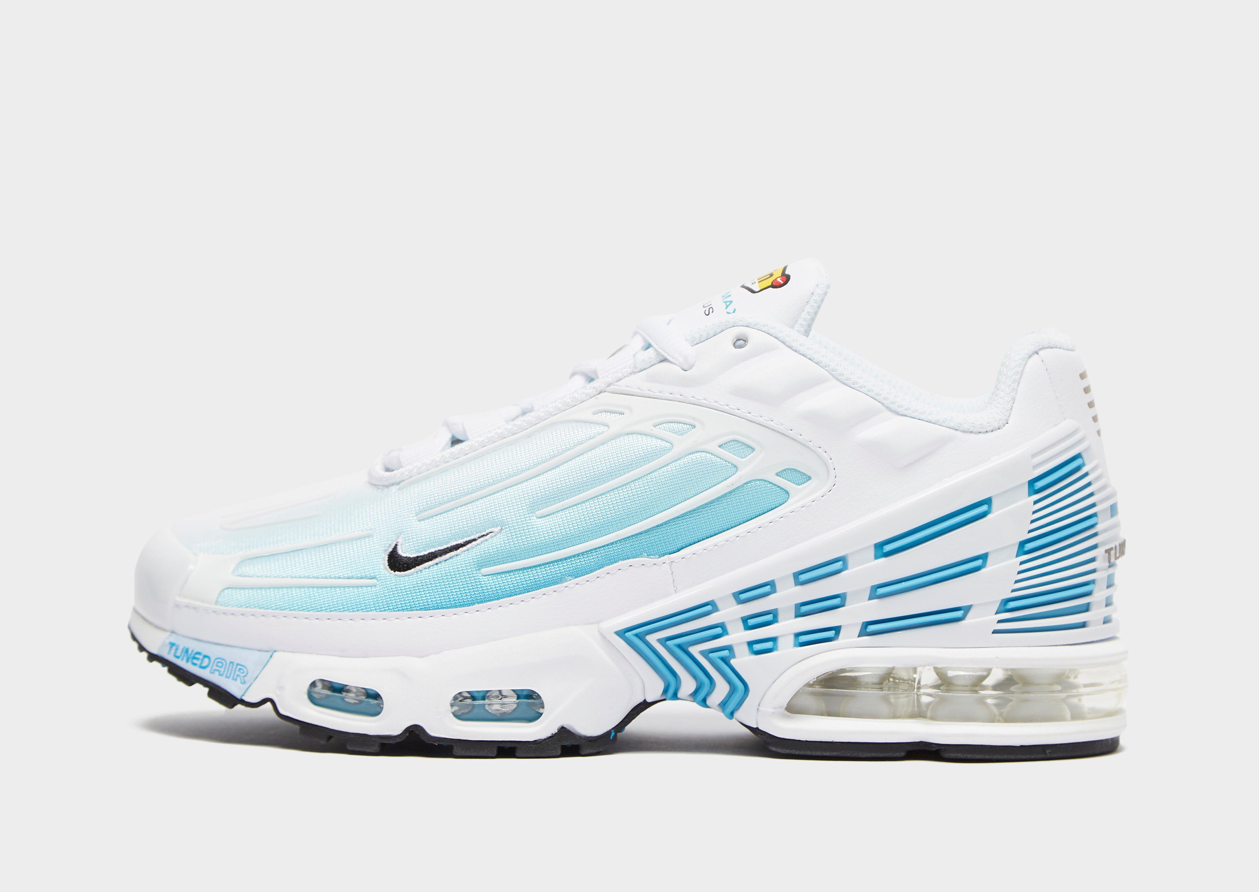 white and blue air max plus