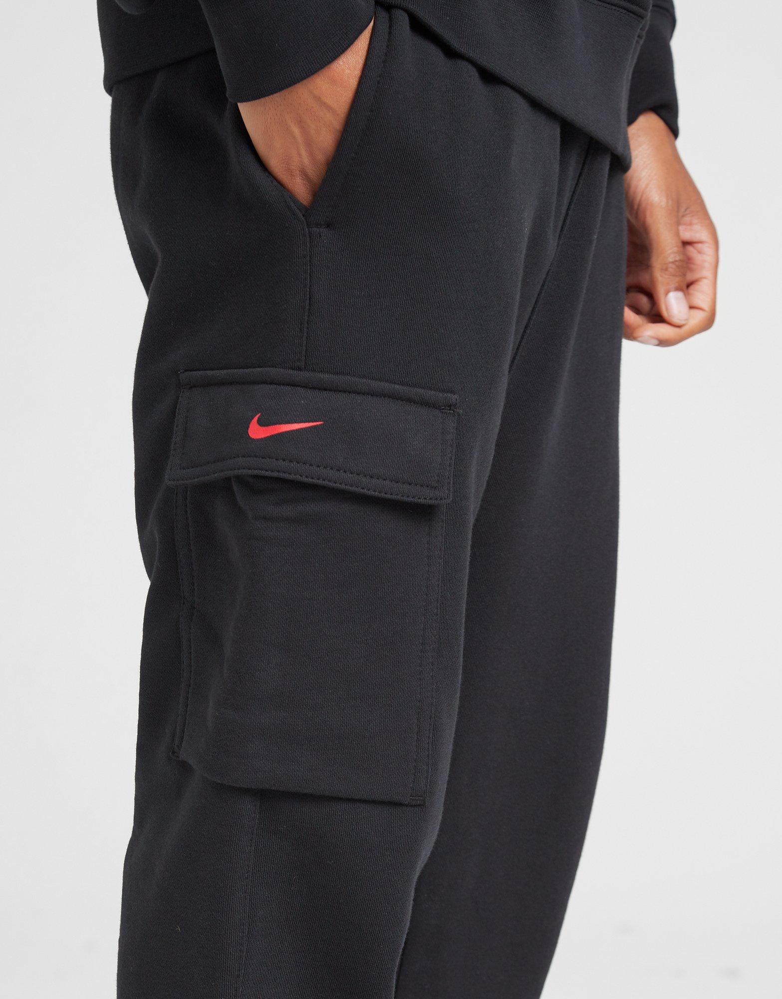 nike on tour cargo track pants