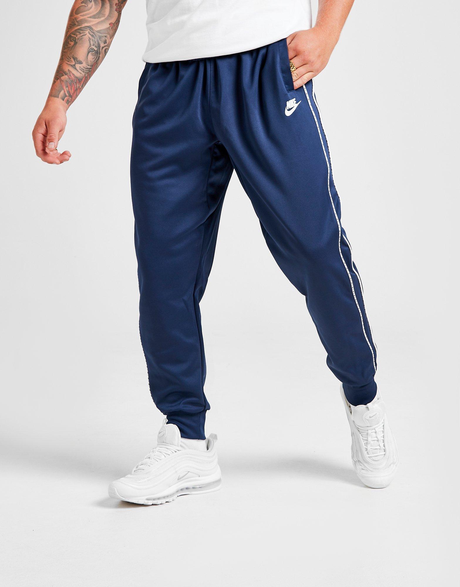 nike navy tape tracksuit