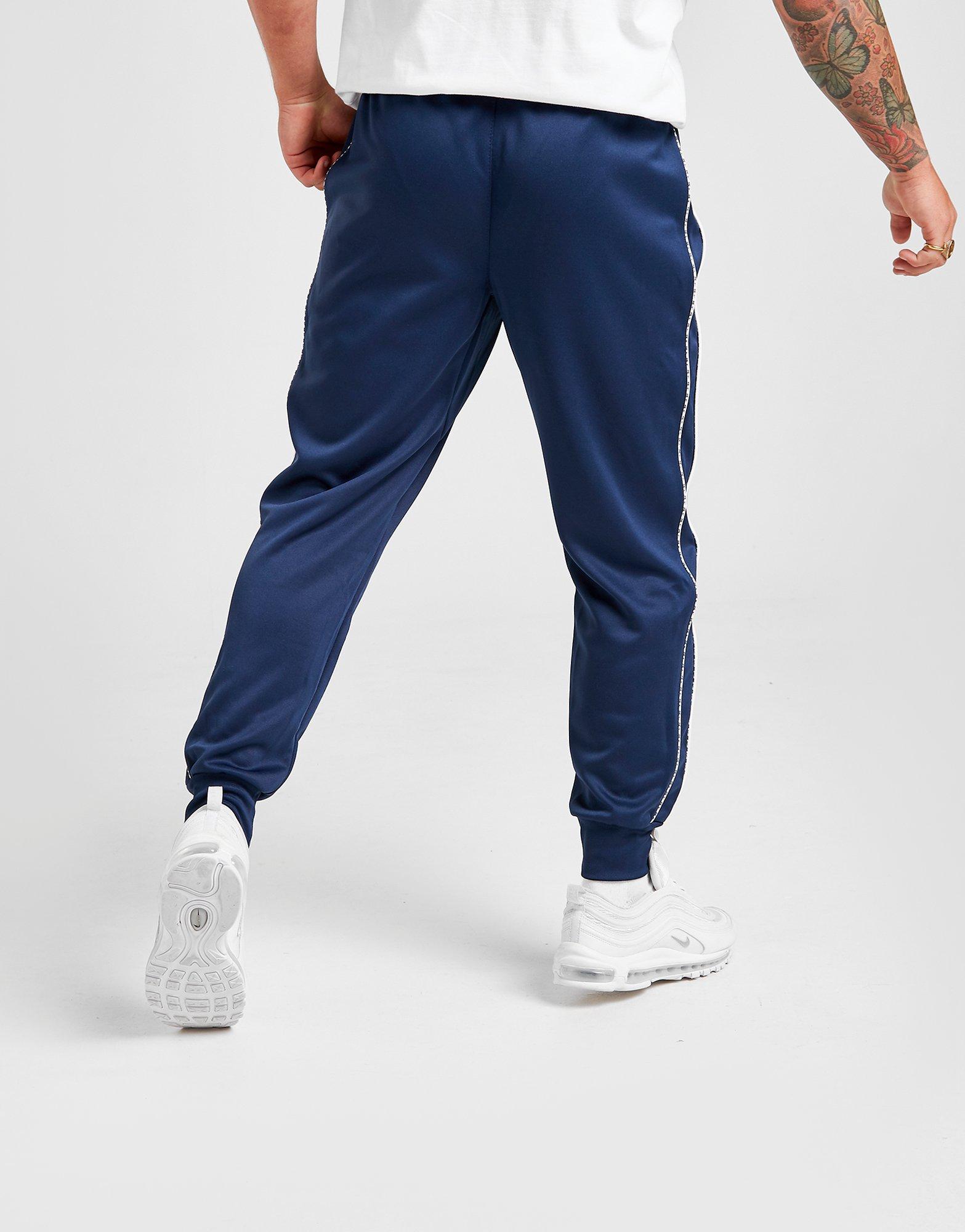 nike poly tape track pants