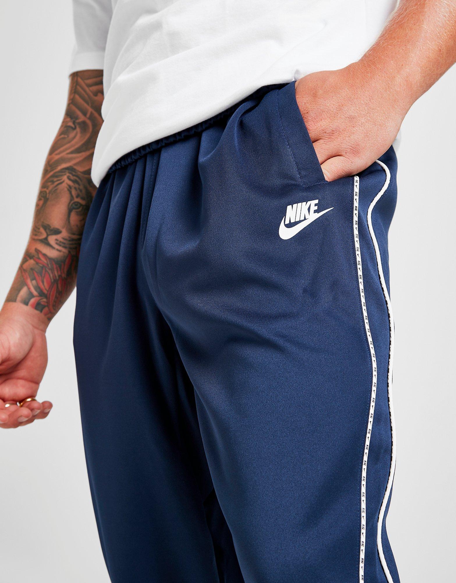 blue nike track pants