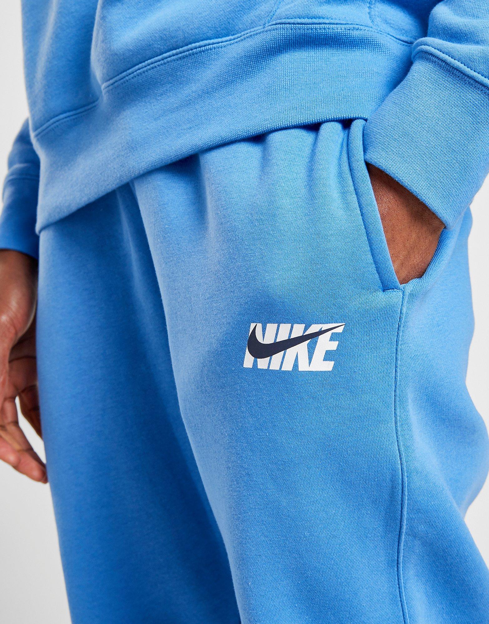 blue nike jogging suit