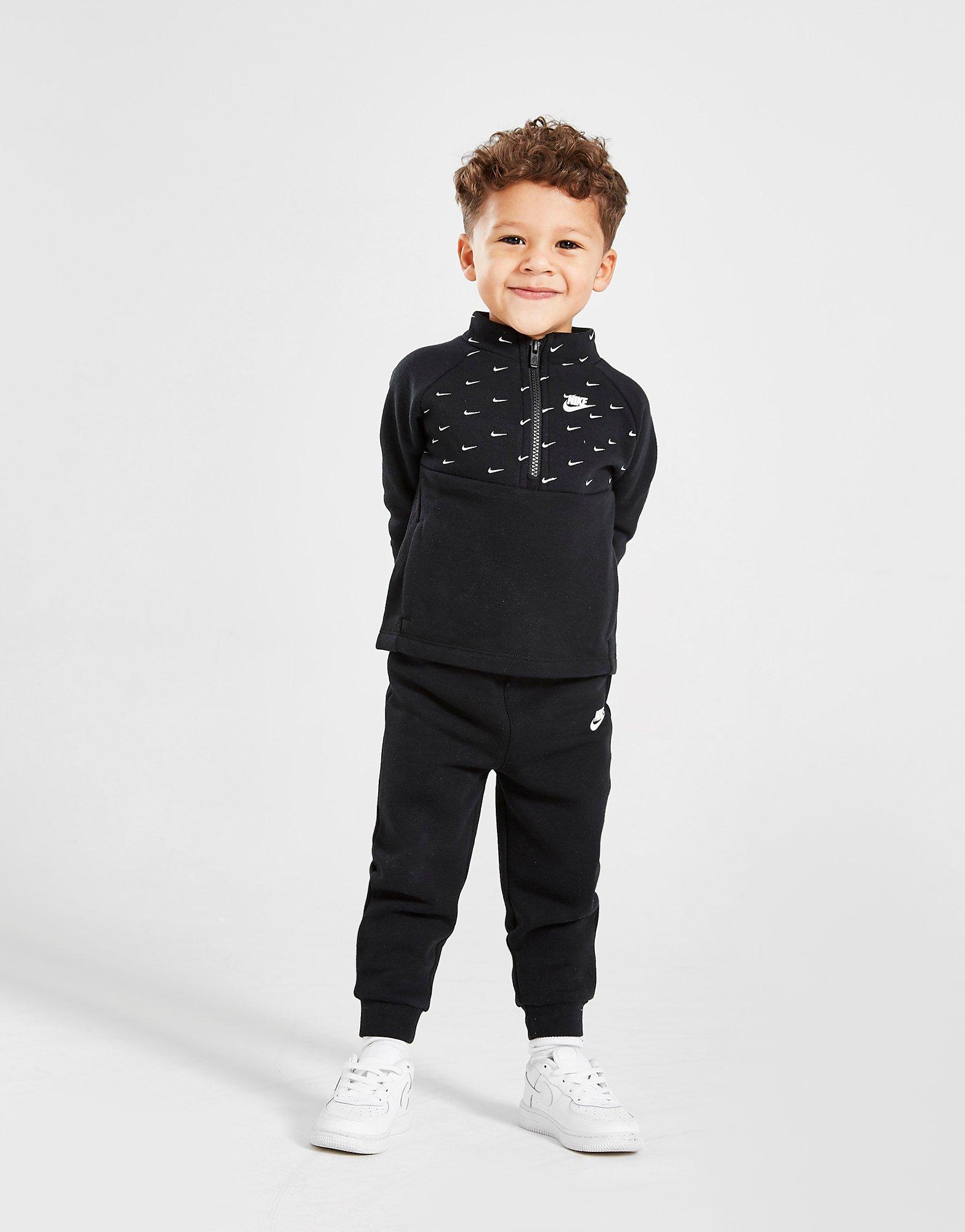 nike all over swoosh tracksuit