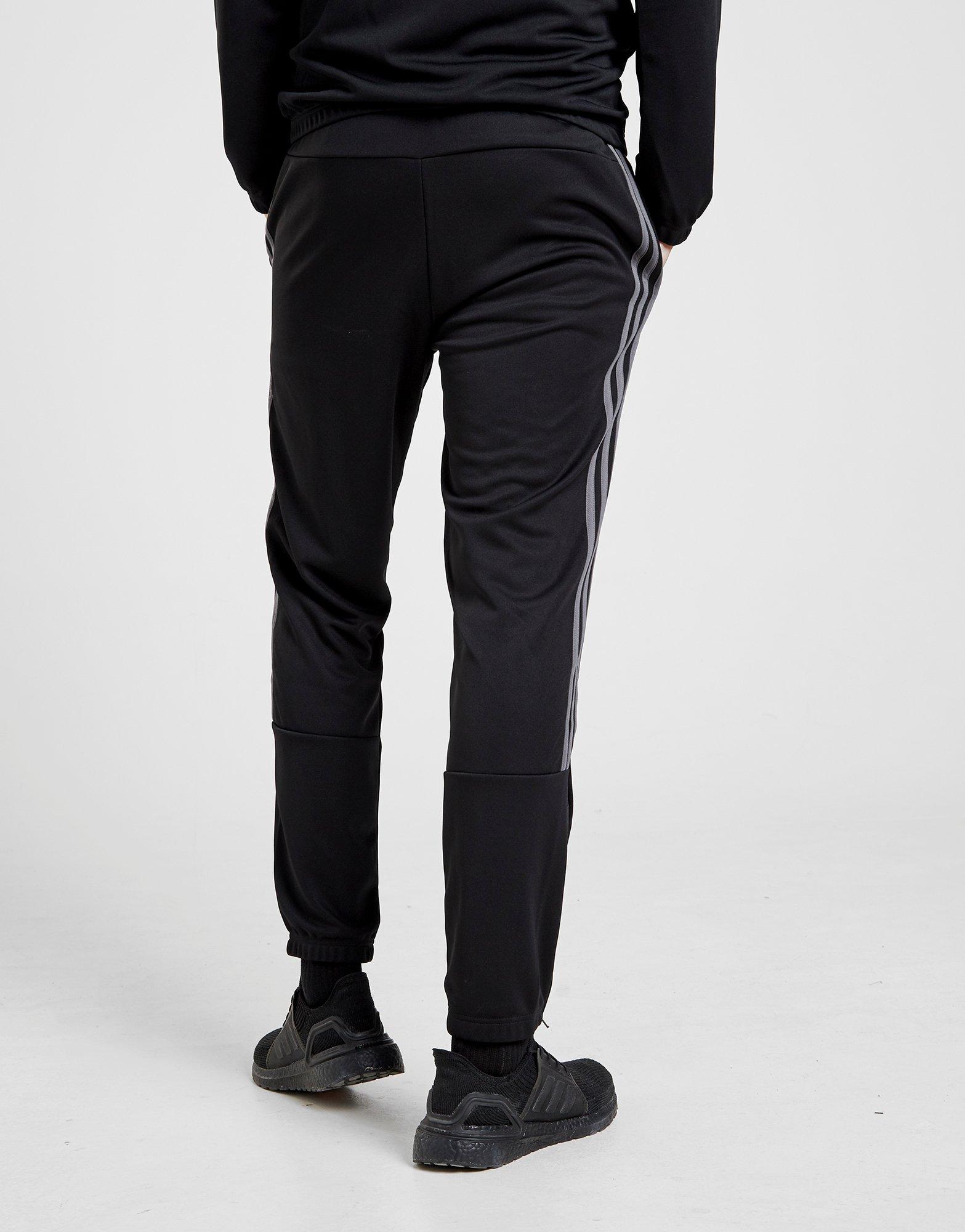 black adidas pants with grey stripes