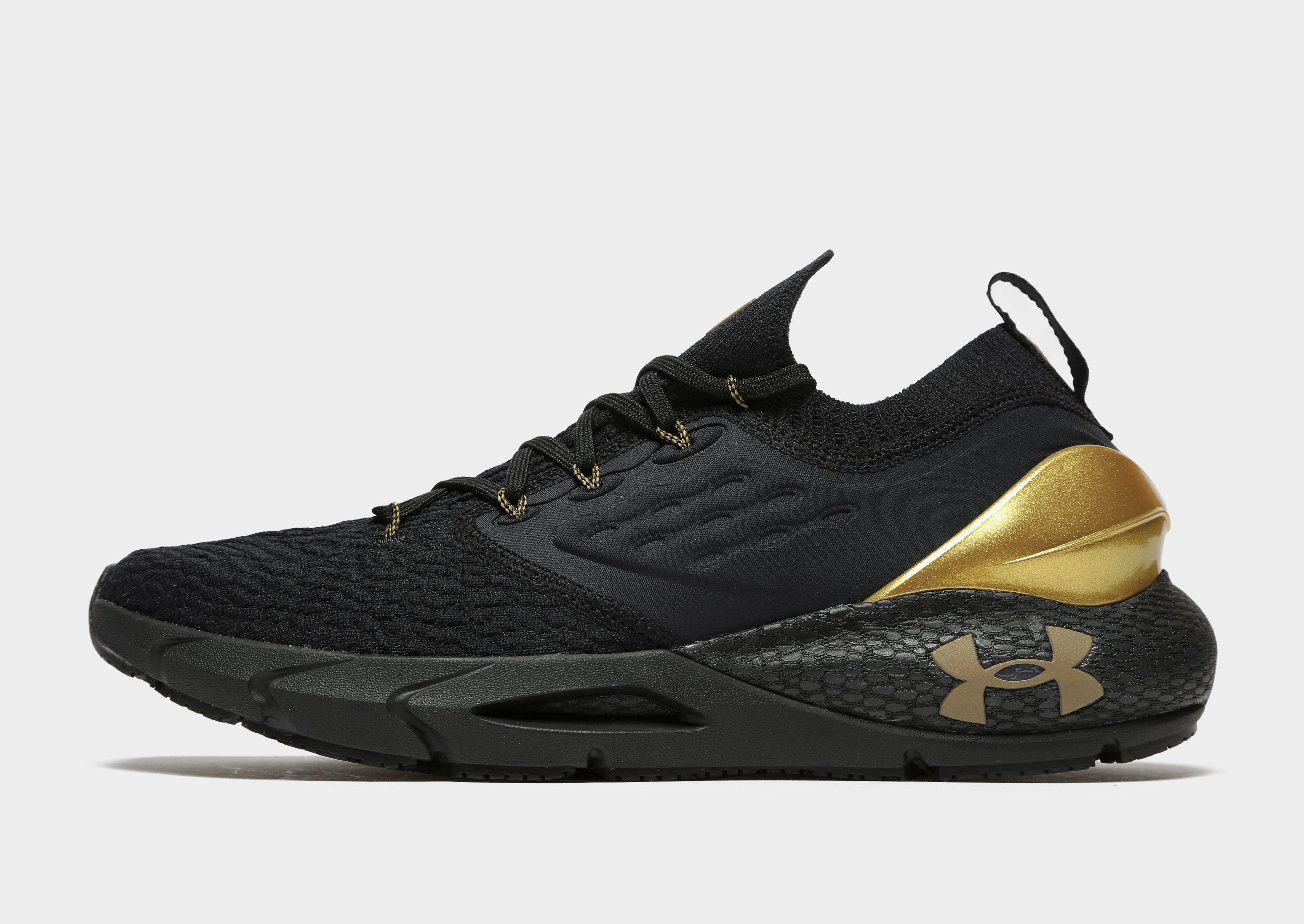 under armour hovr phantom black gold