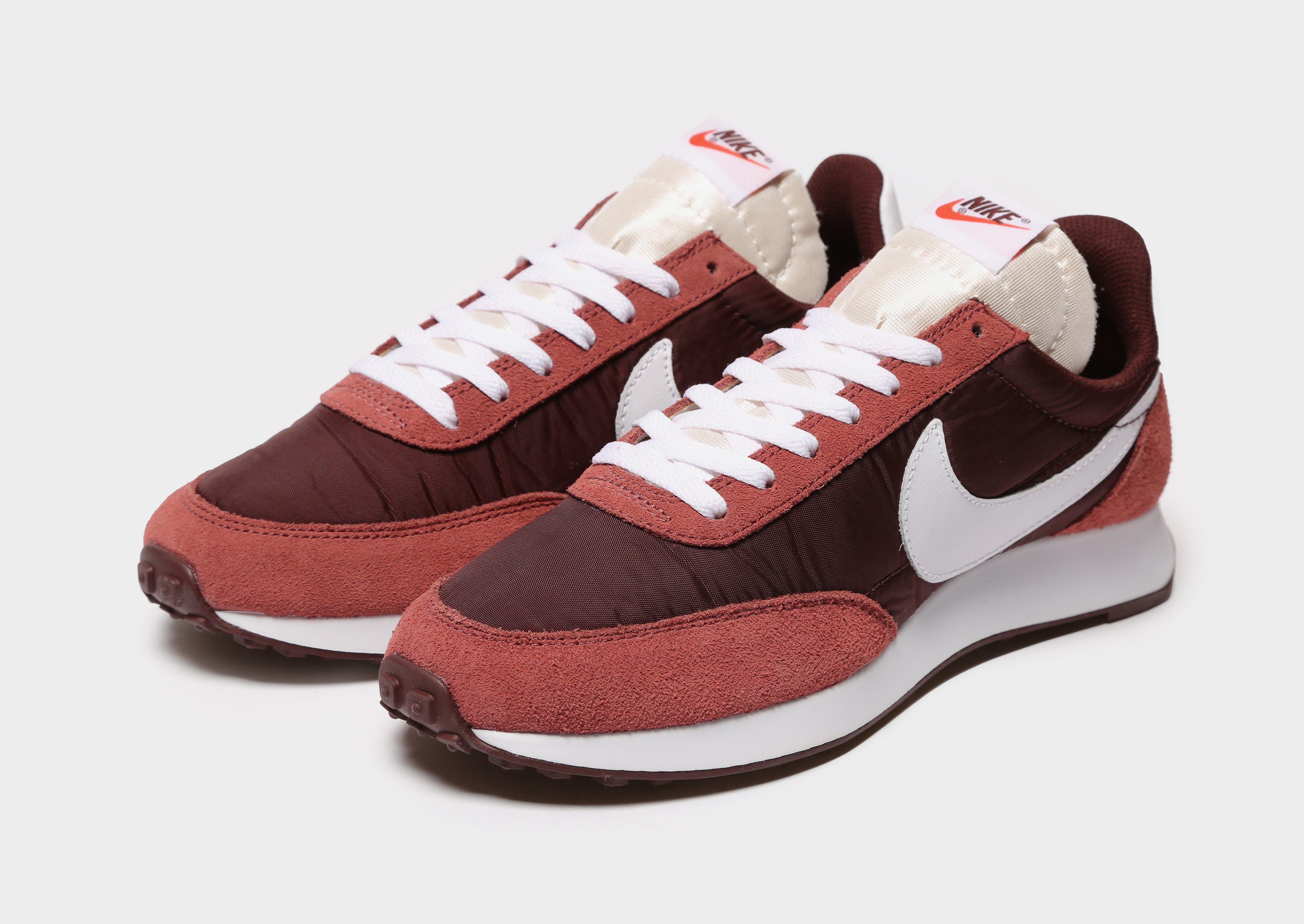 red nike tailwind 79