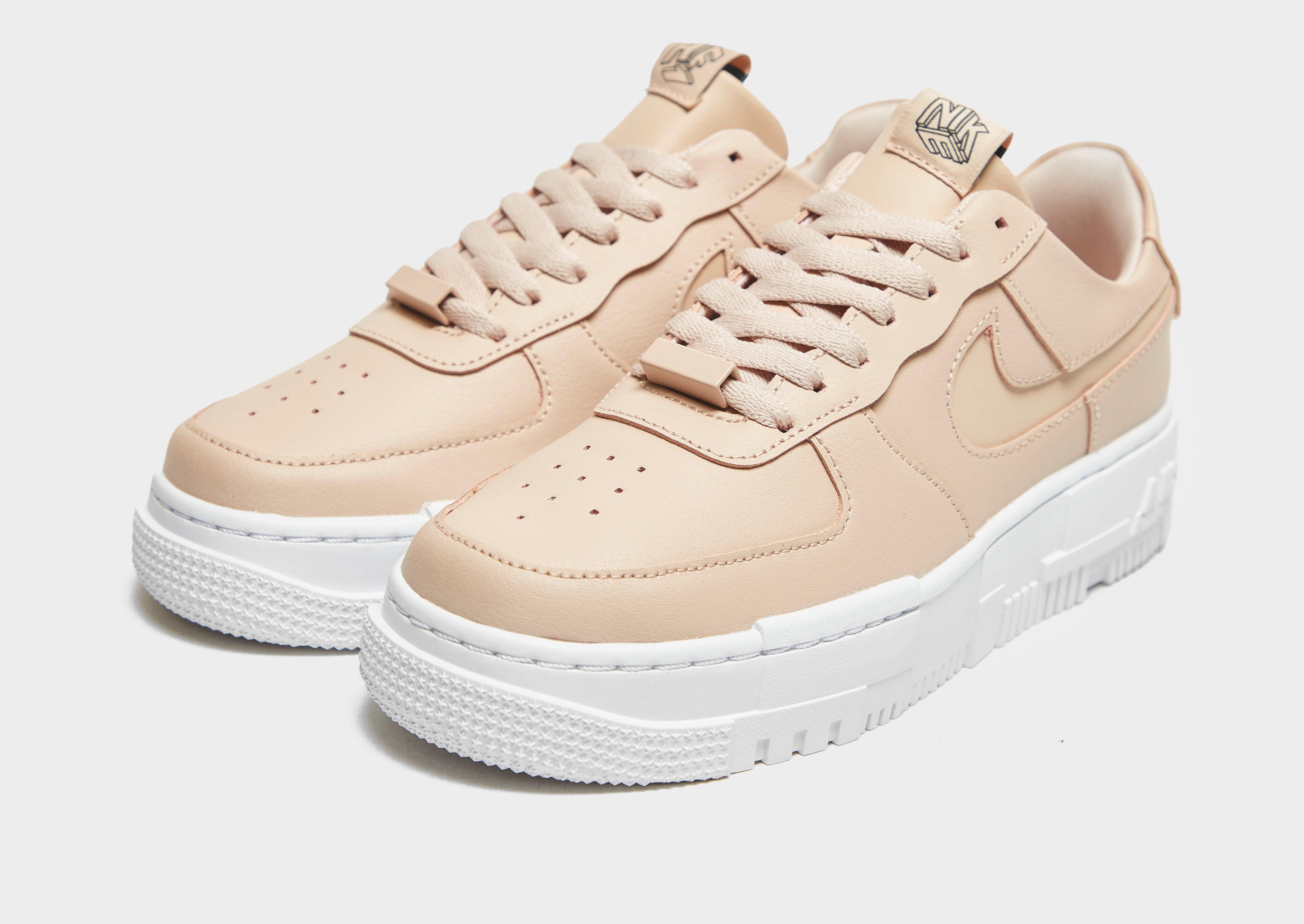 nike international beige