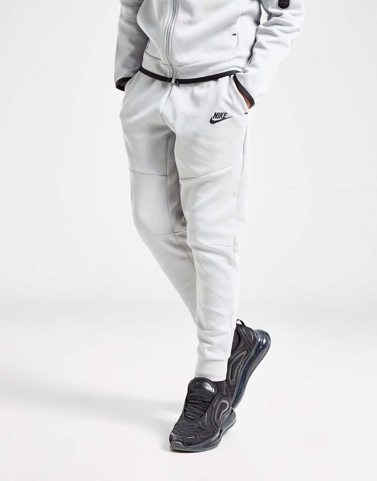 nike tech track pants