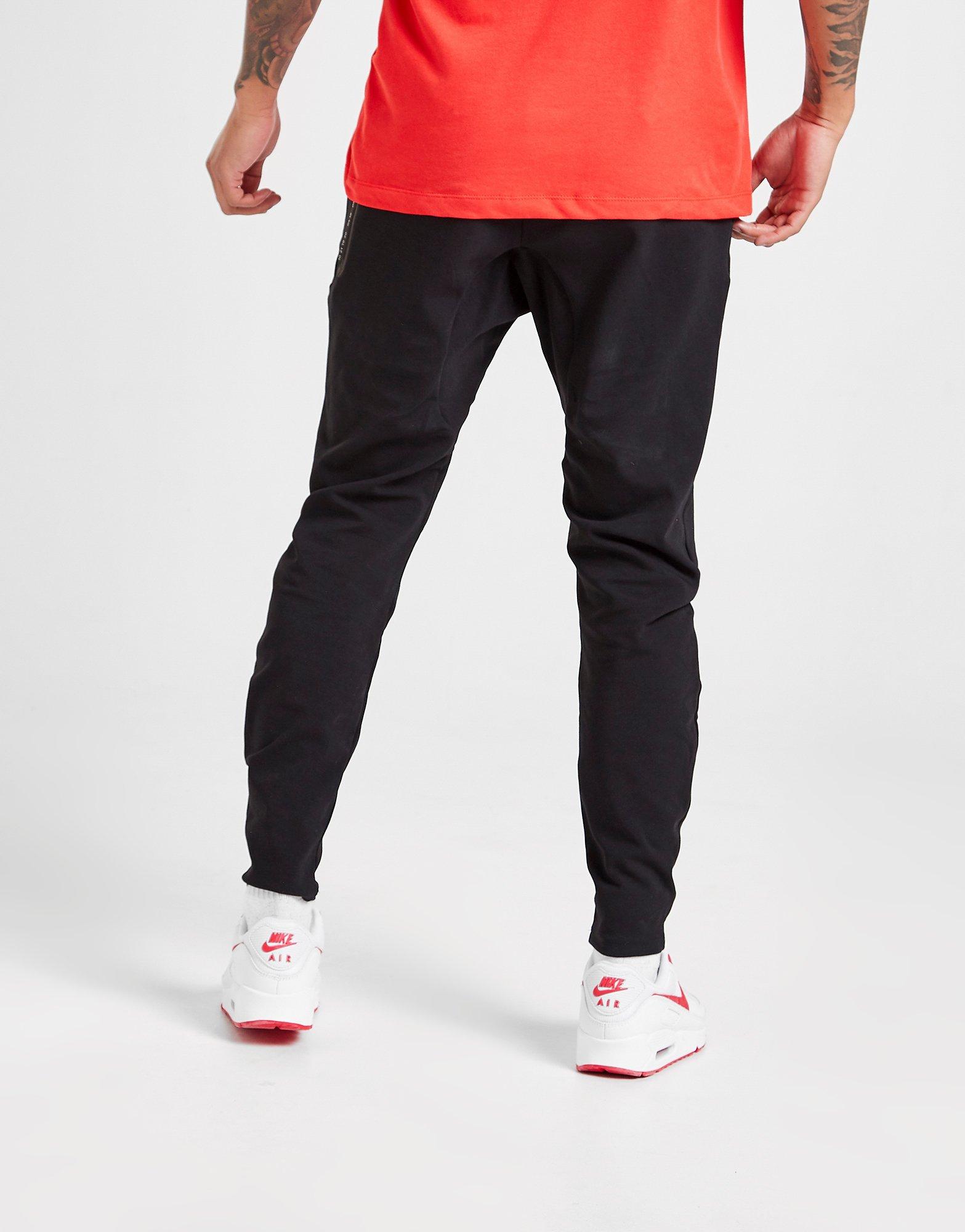 nike tech track pants