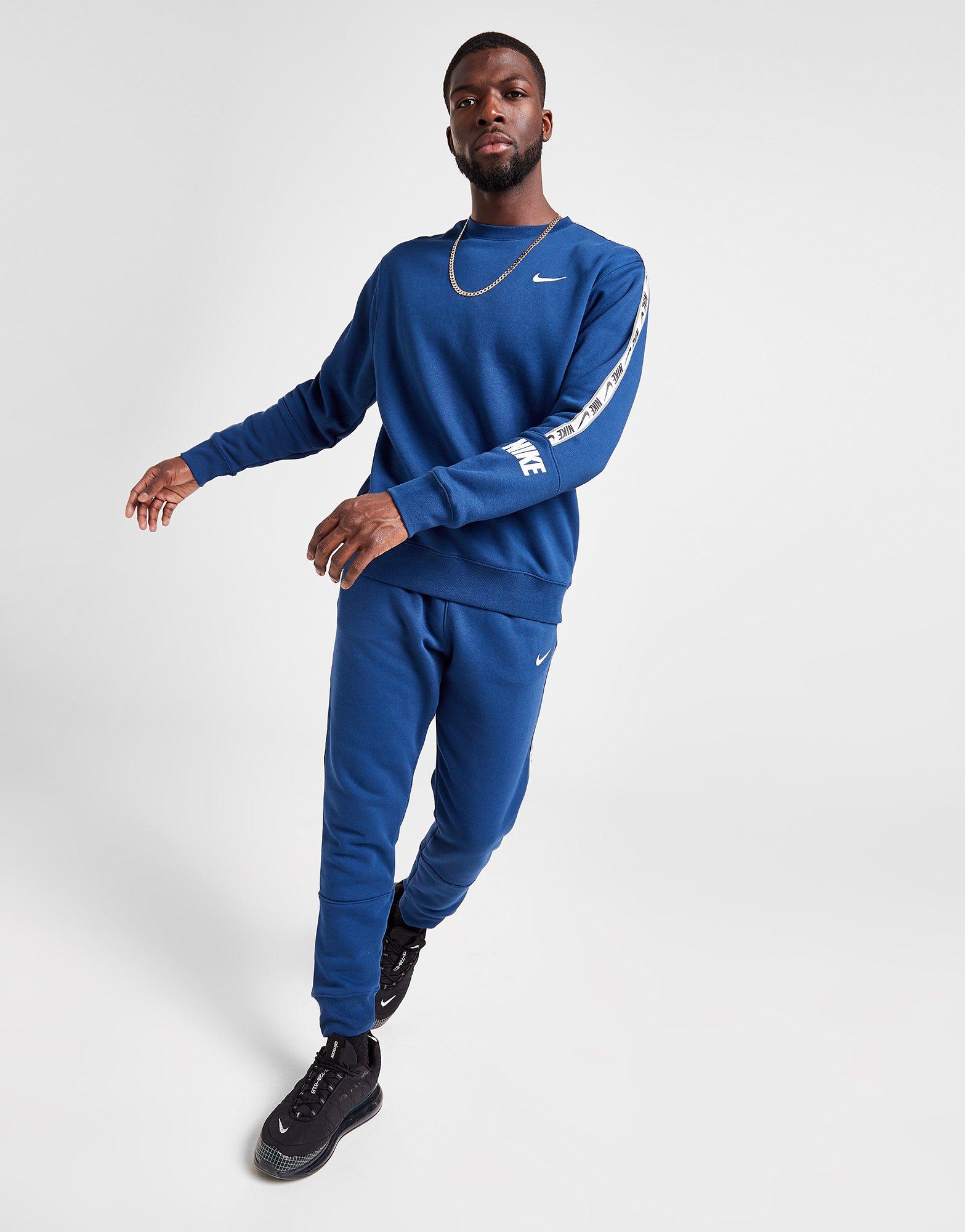 blue nike tape tracksuit