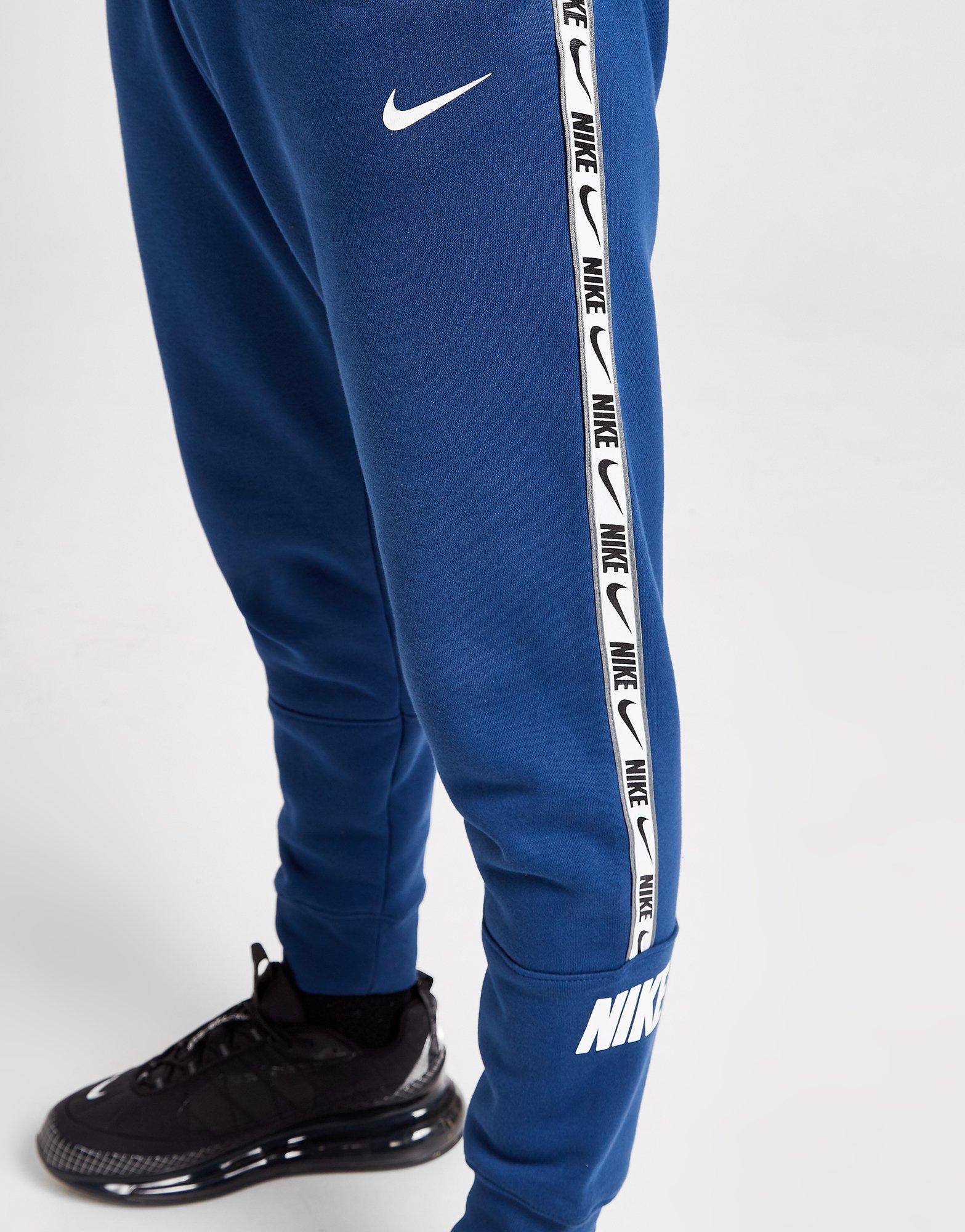 blue nike tape joggers