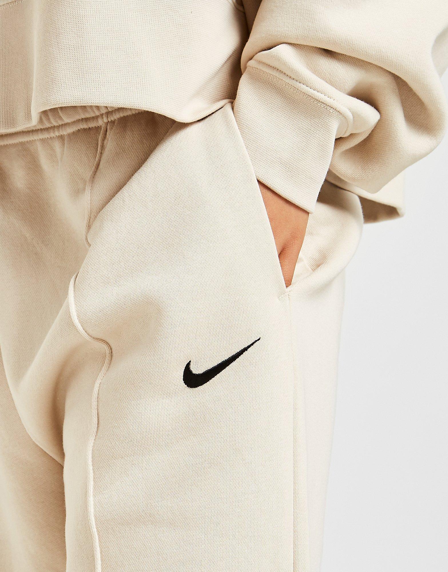 beige nike joggers