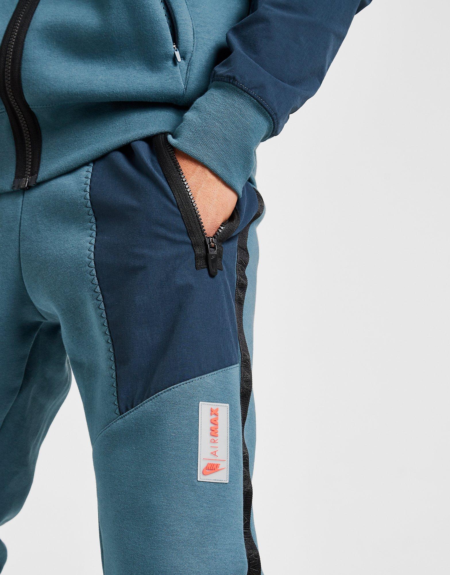 nike air tracksuit grey and green