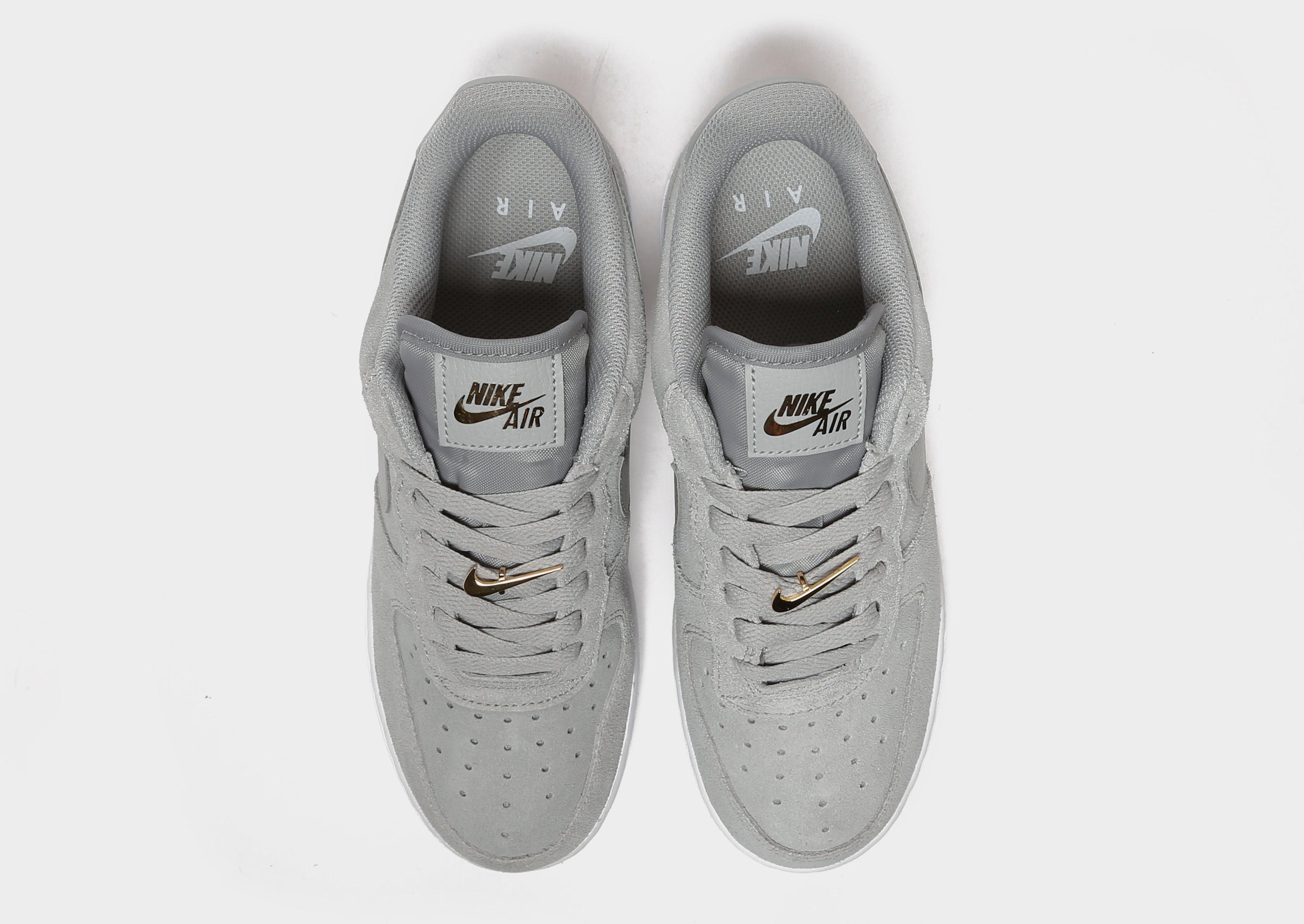 nike air force 1 grey gold