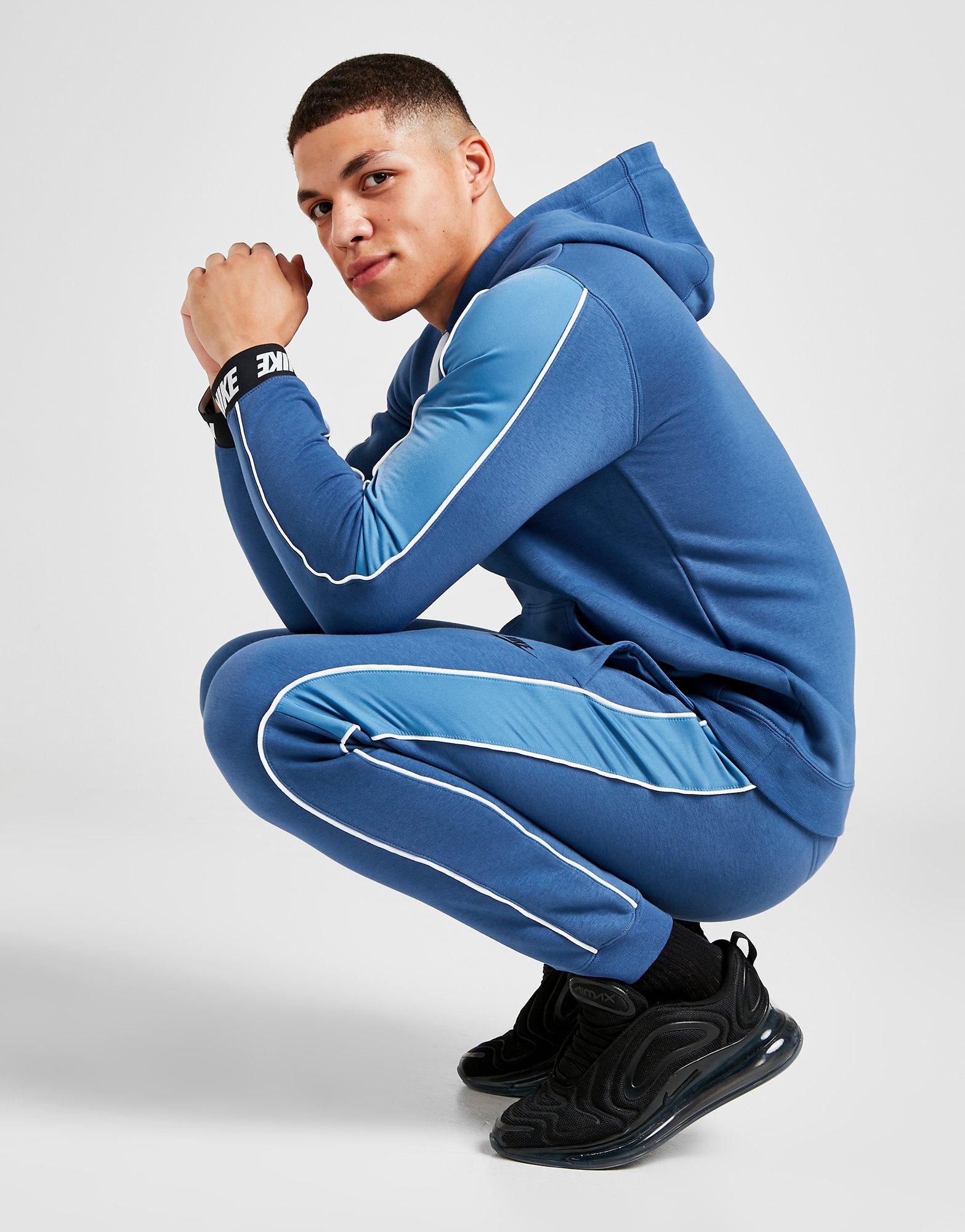 blue nike hybrid tracksuit