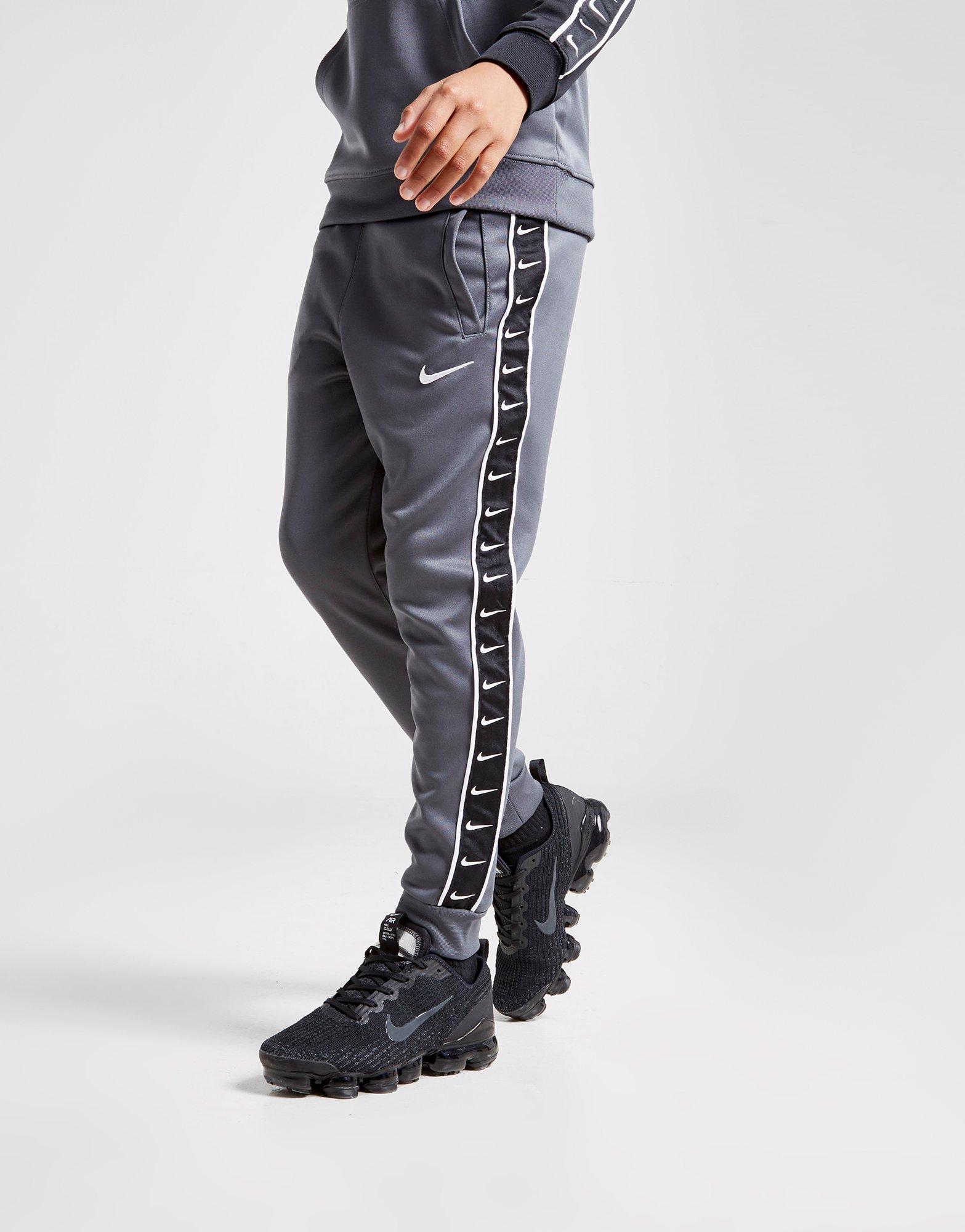 mens nike taped joggers