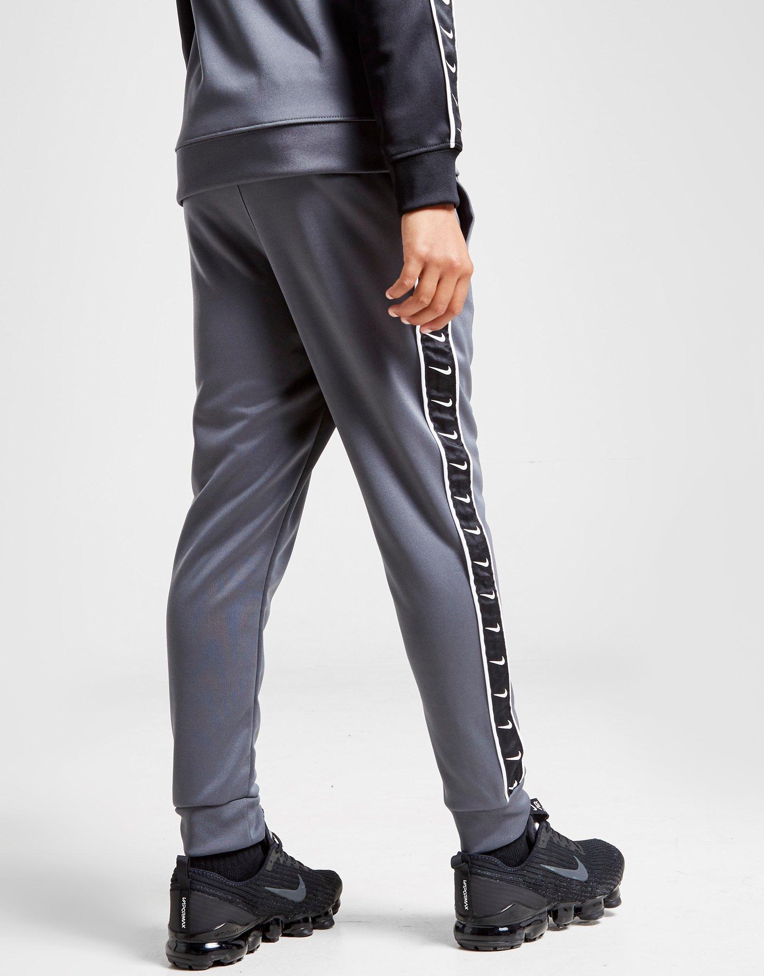 mens nike taped joggers