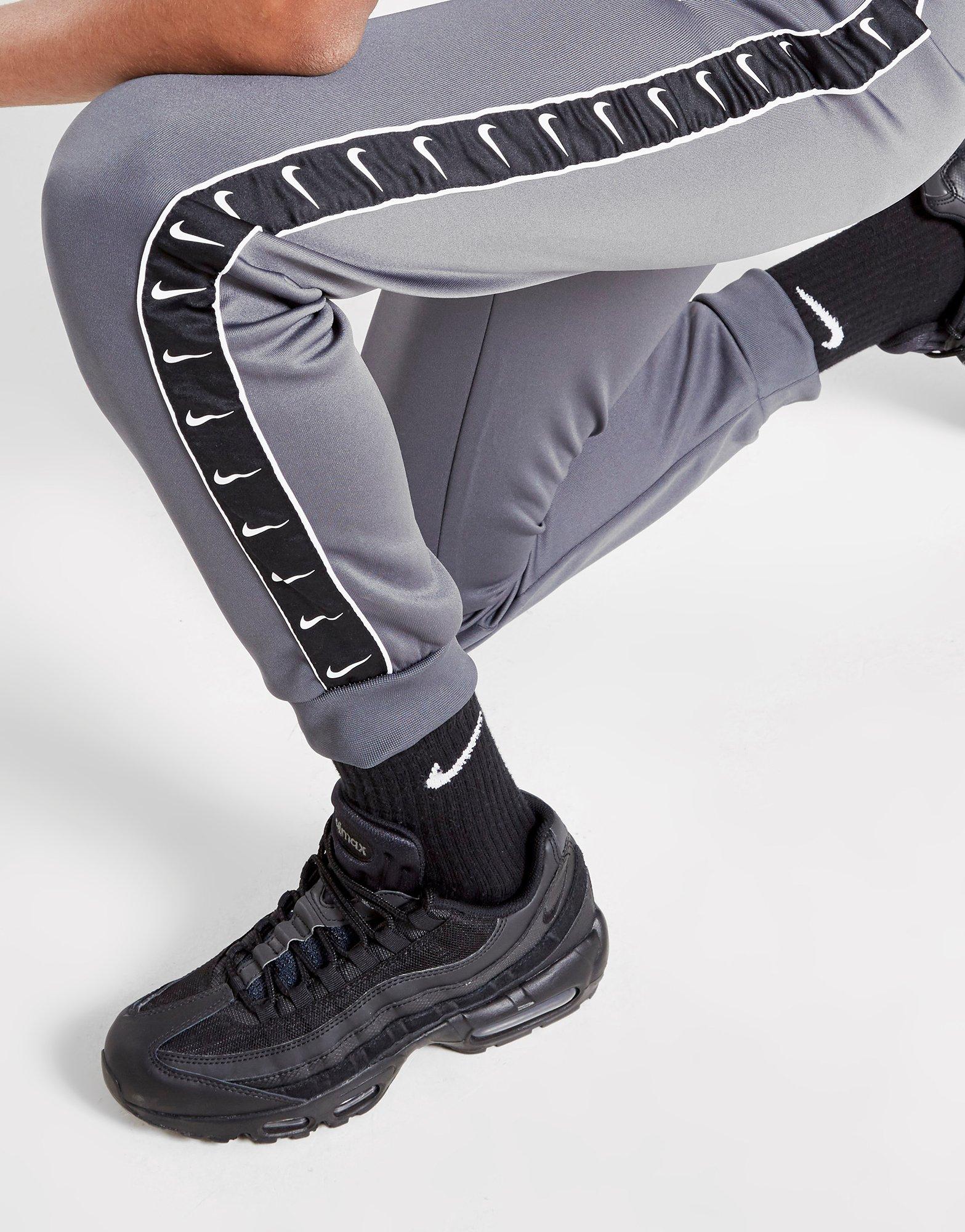 nike tape track pants grey