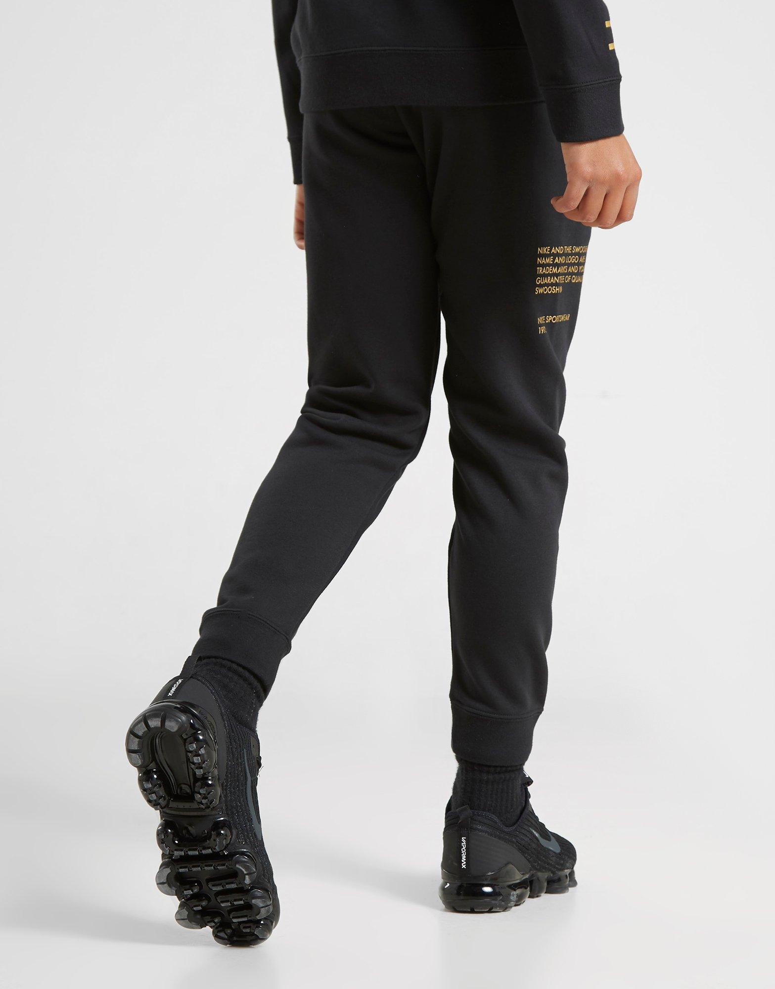 nike swoosh black joggers