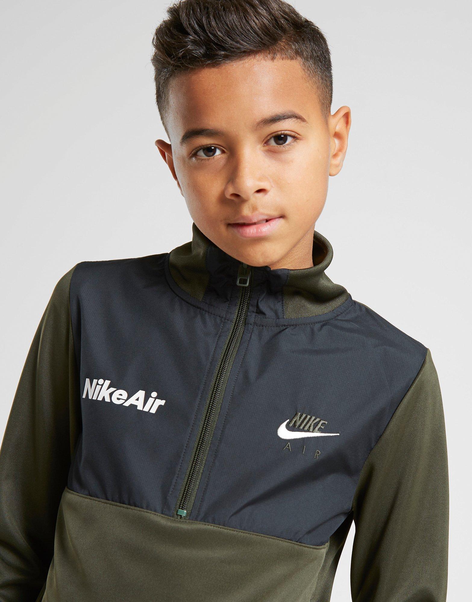 green nike tracksuit junior