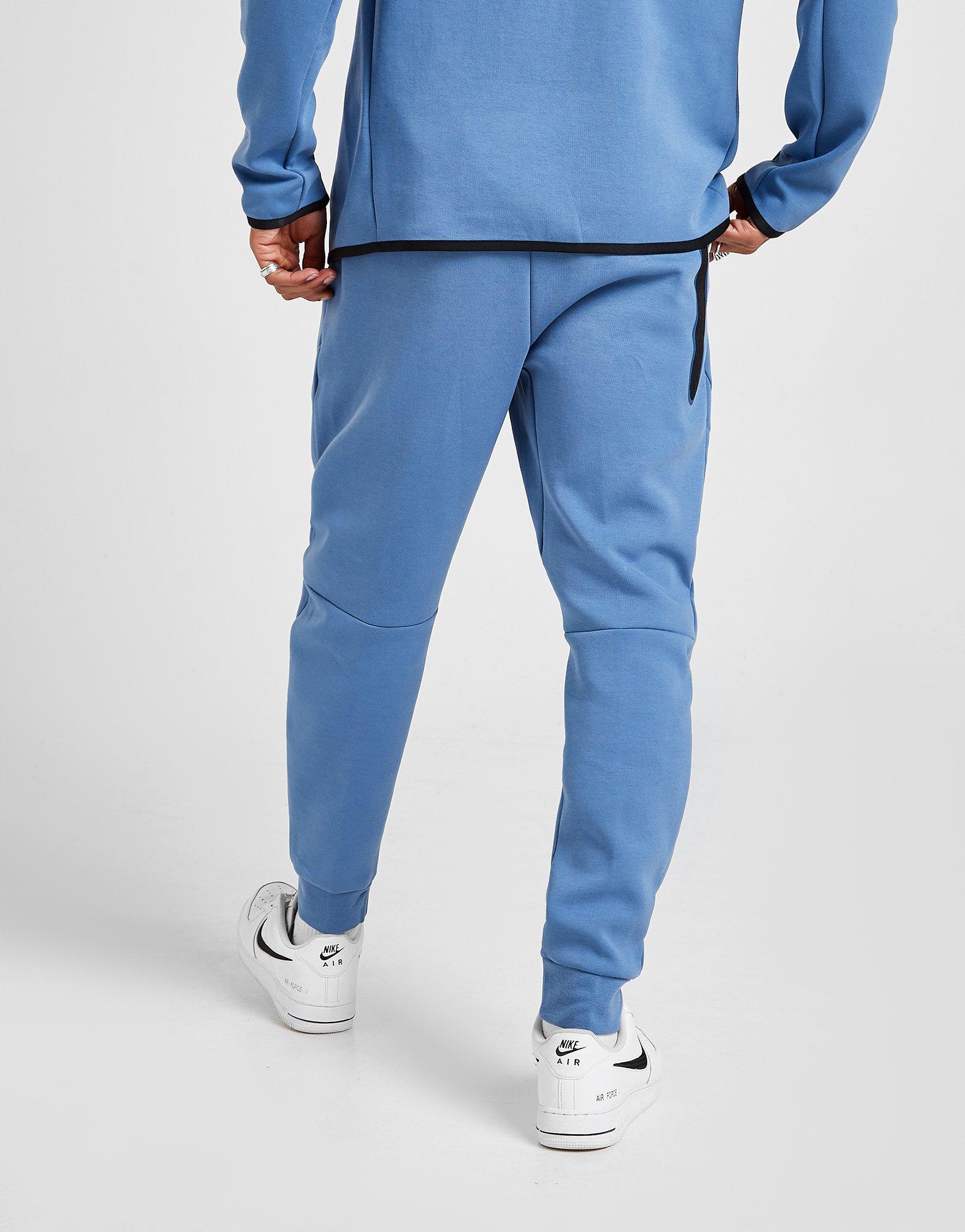 nike tech fleece pants blue