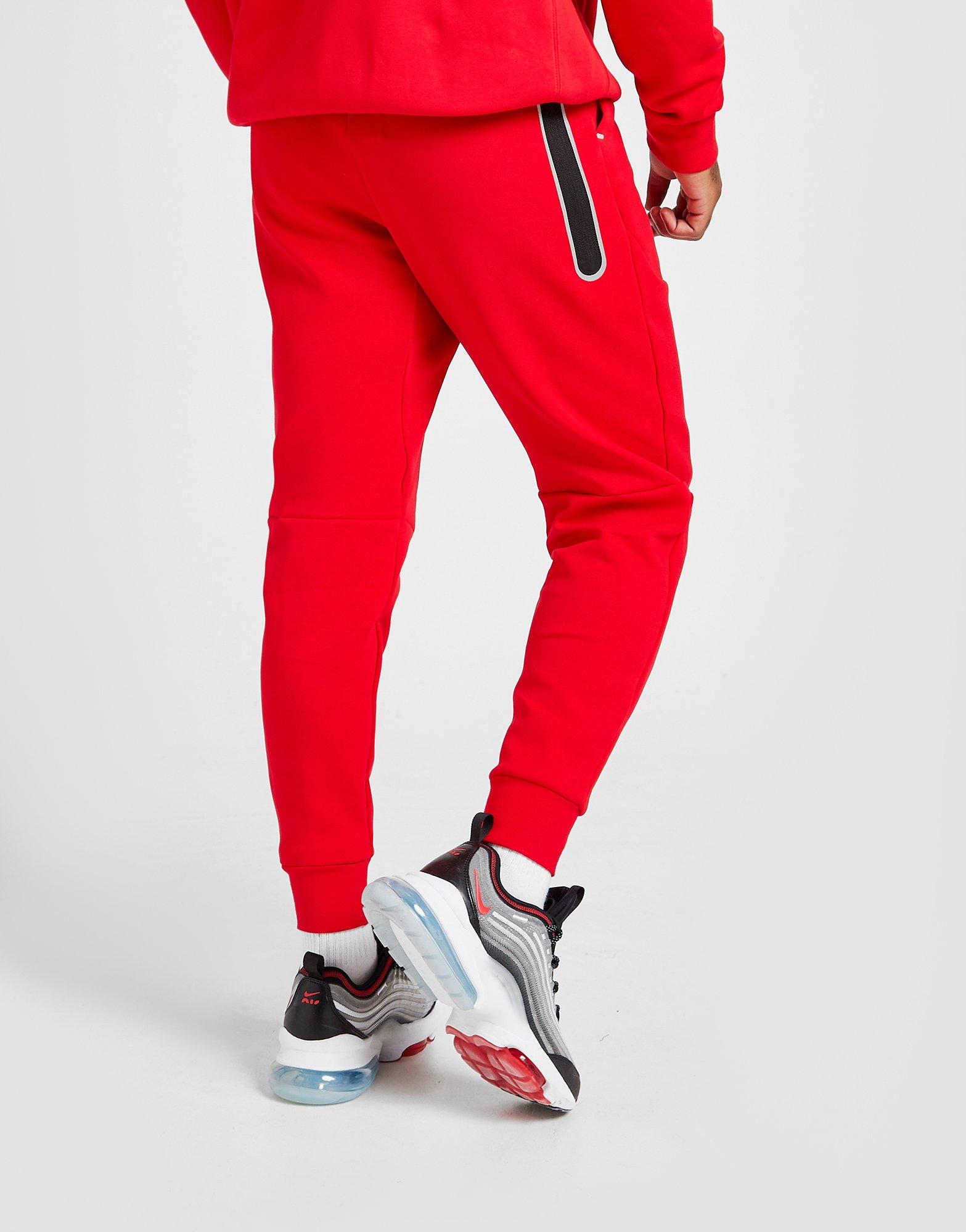 nike tech joggers red