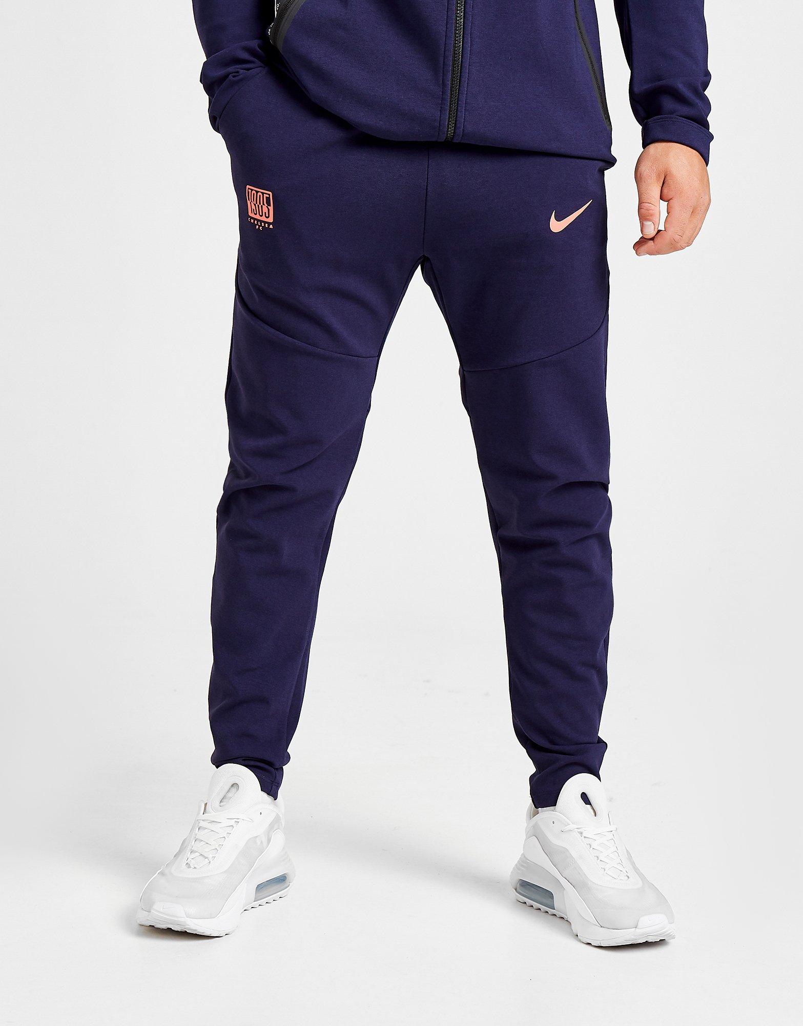 nike tech track pants