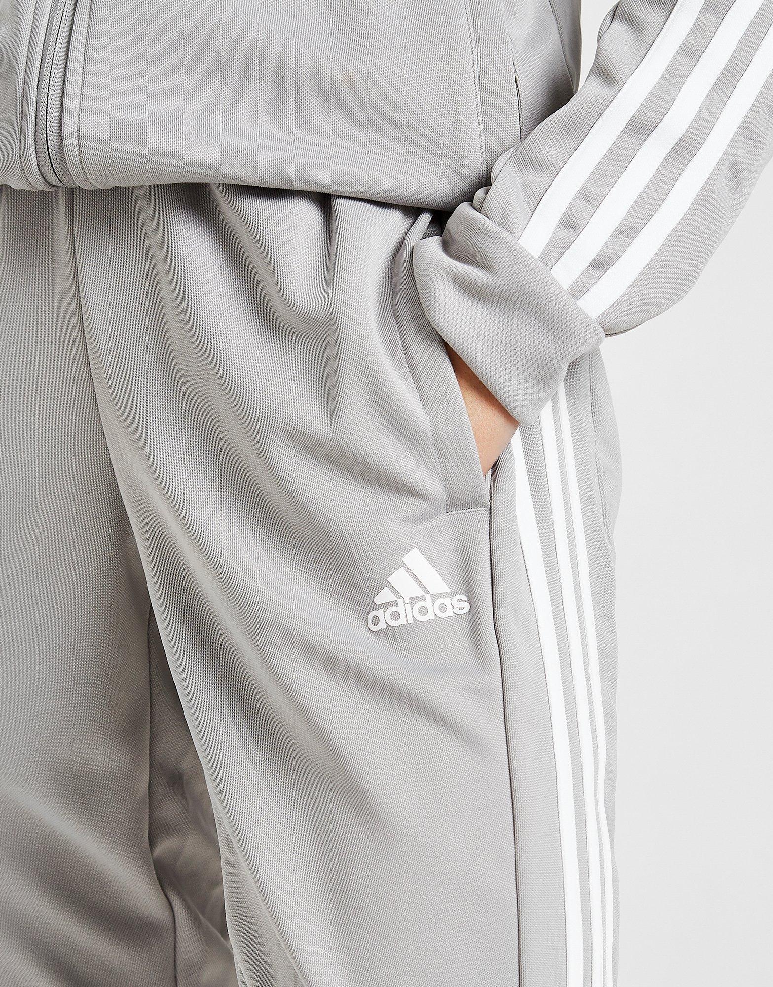 grey nike tracksuit with white stripe