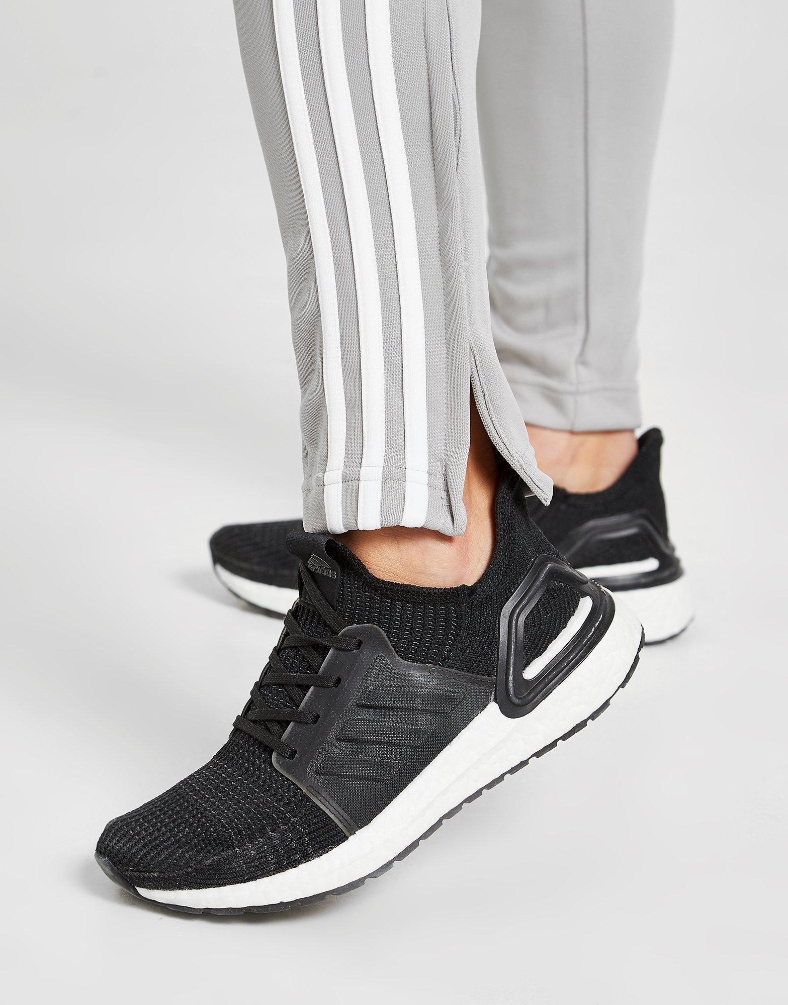 grey nike tracksuit with white stripe