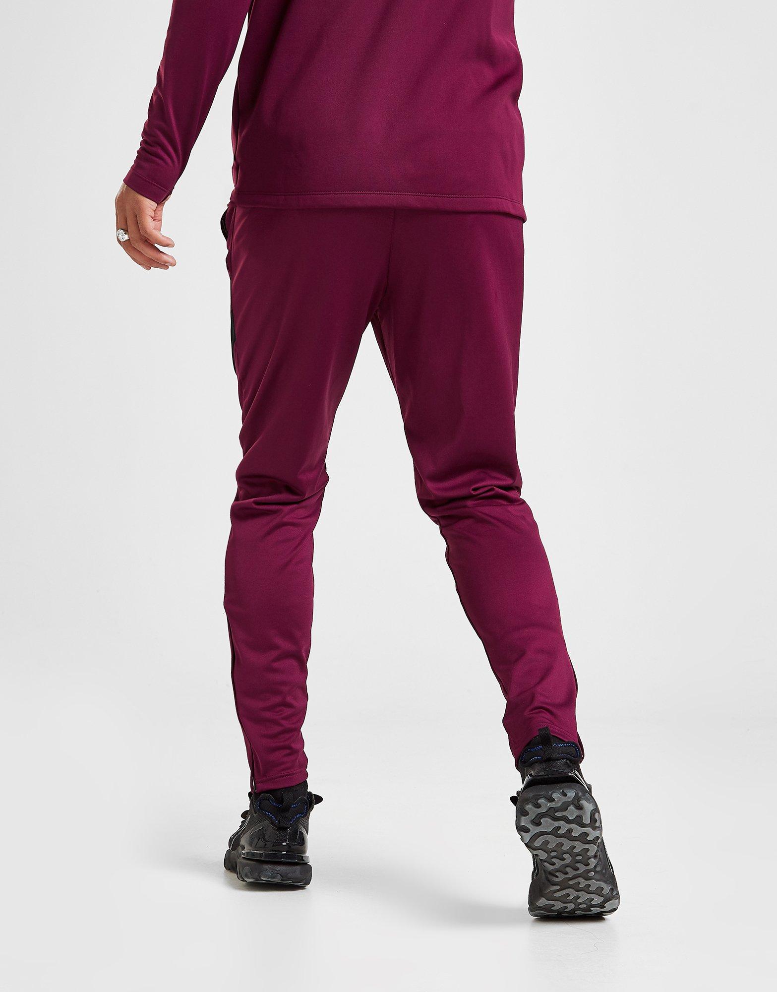 red nike track pants